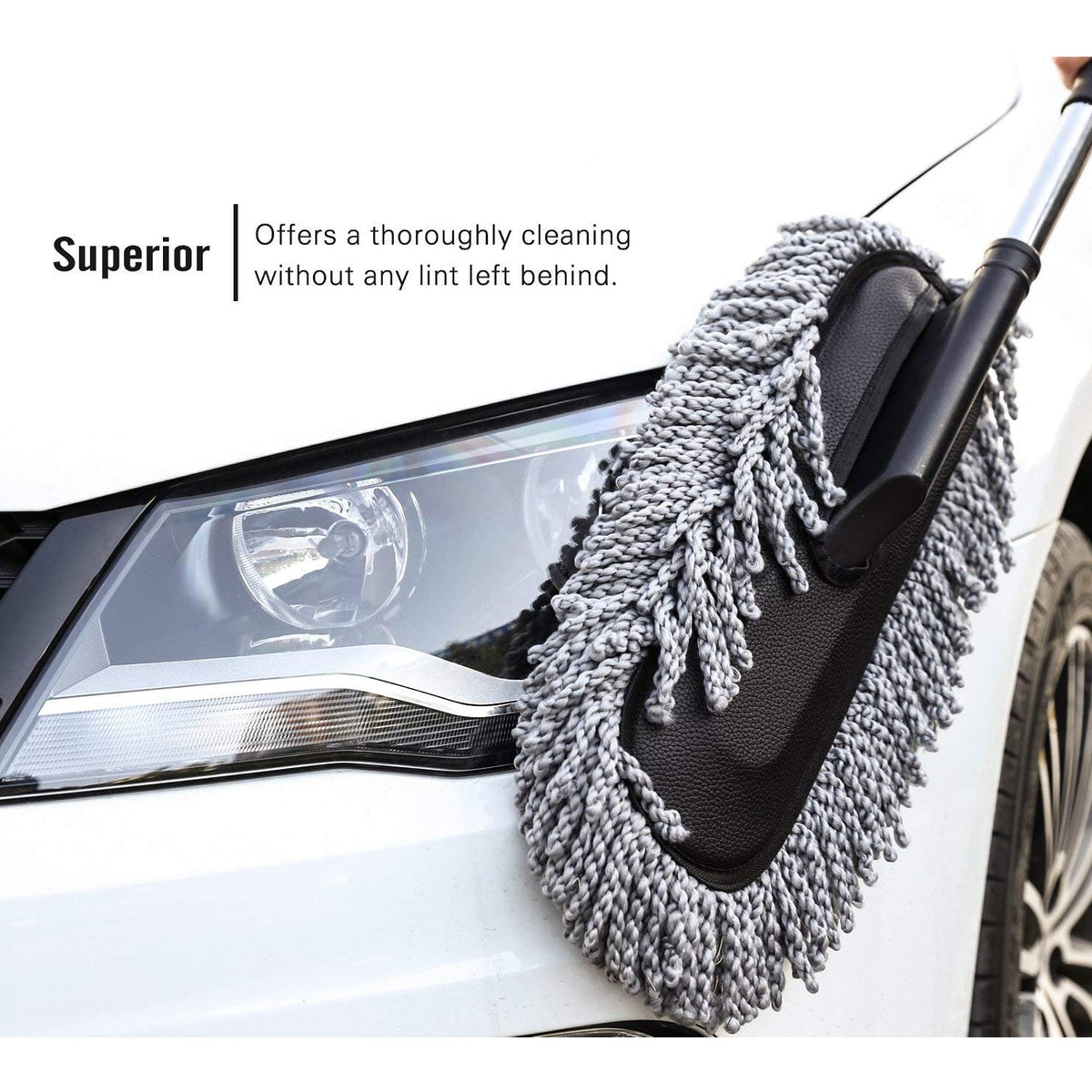 A gray and black microfiber car duster cleaning the front headlight and hood of a white car, with text about superior