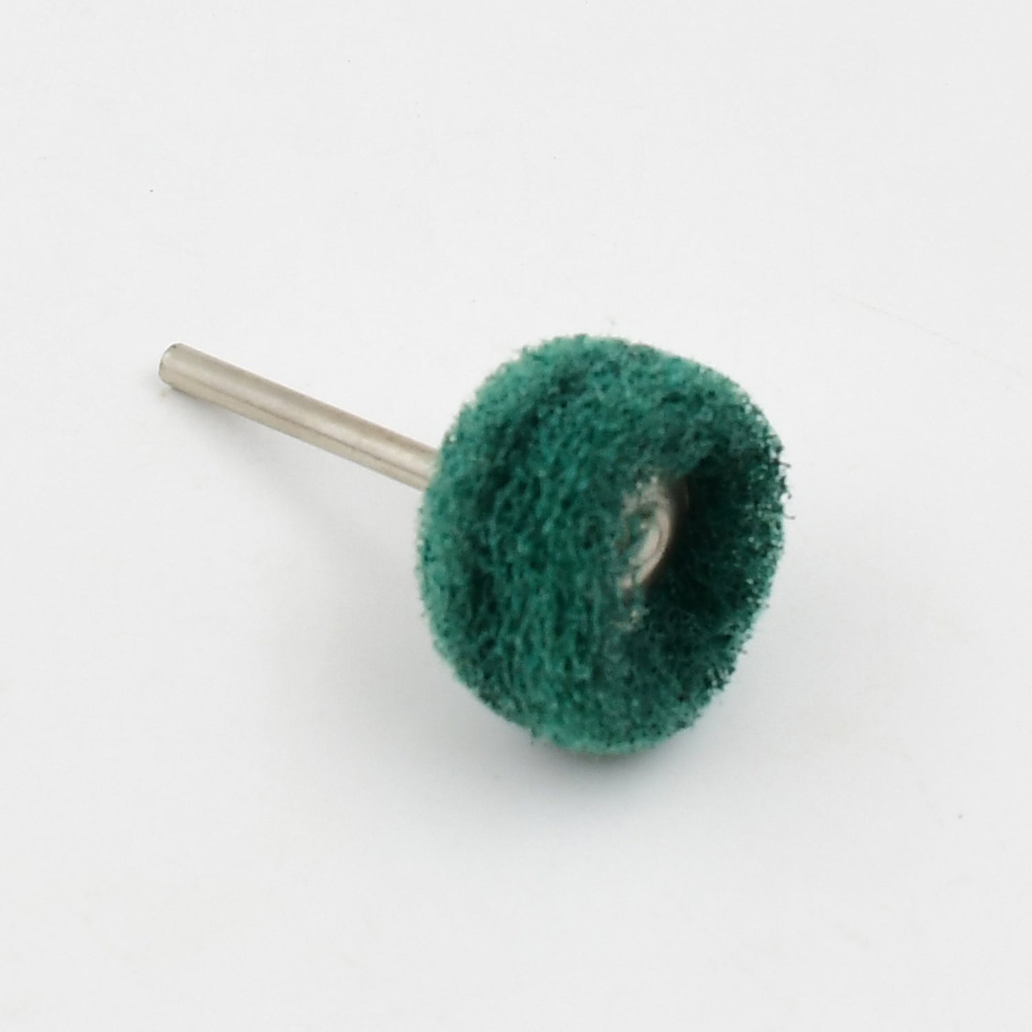 A single green polishing wheel with a metal shank on a plain white background.