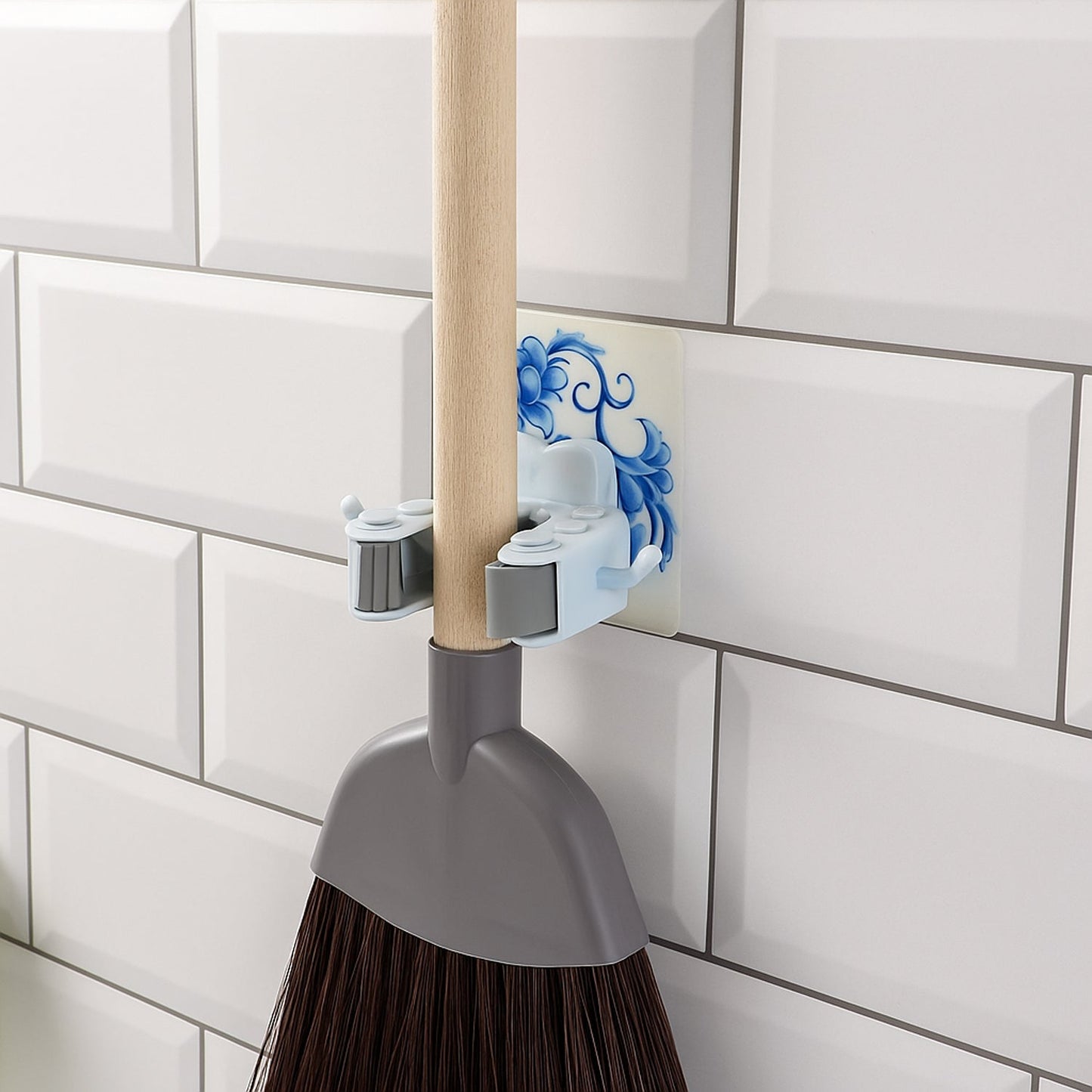 Back view of wall mounted mop and broom holder showing strong adhesive