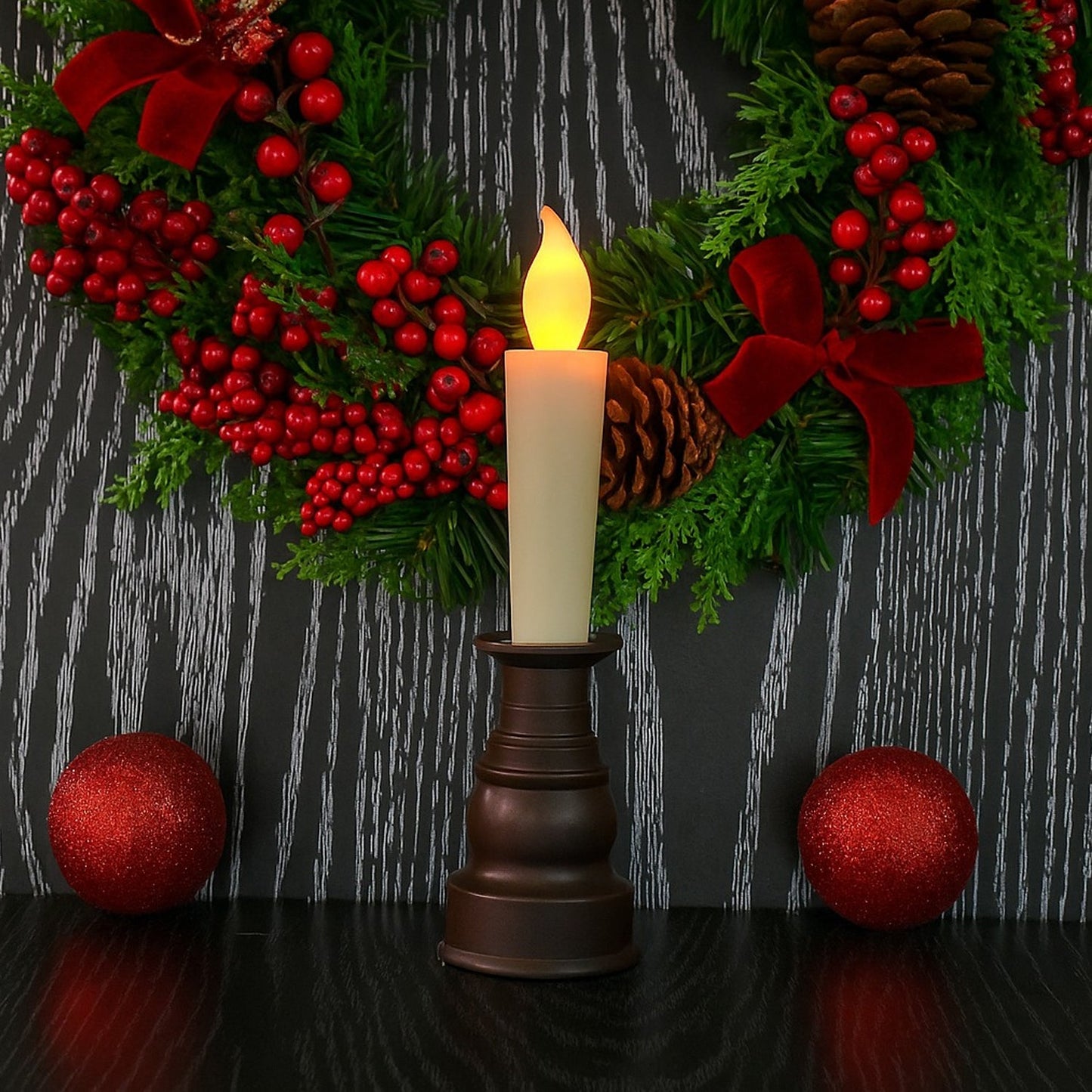 Close-up of premium decorative LED candle flame and classic holder