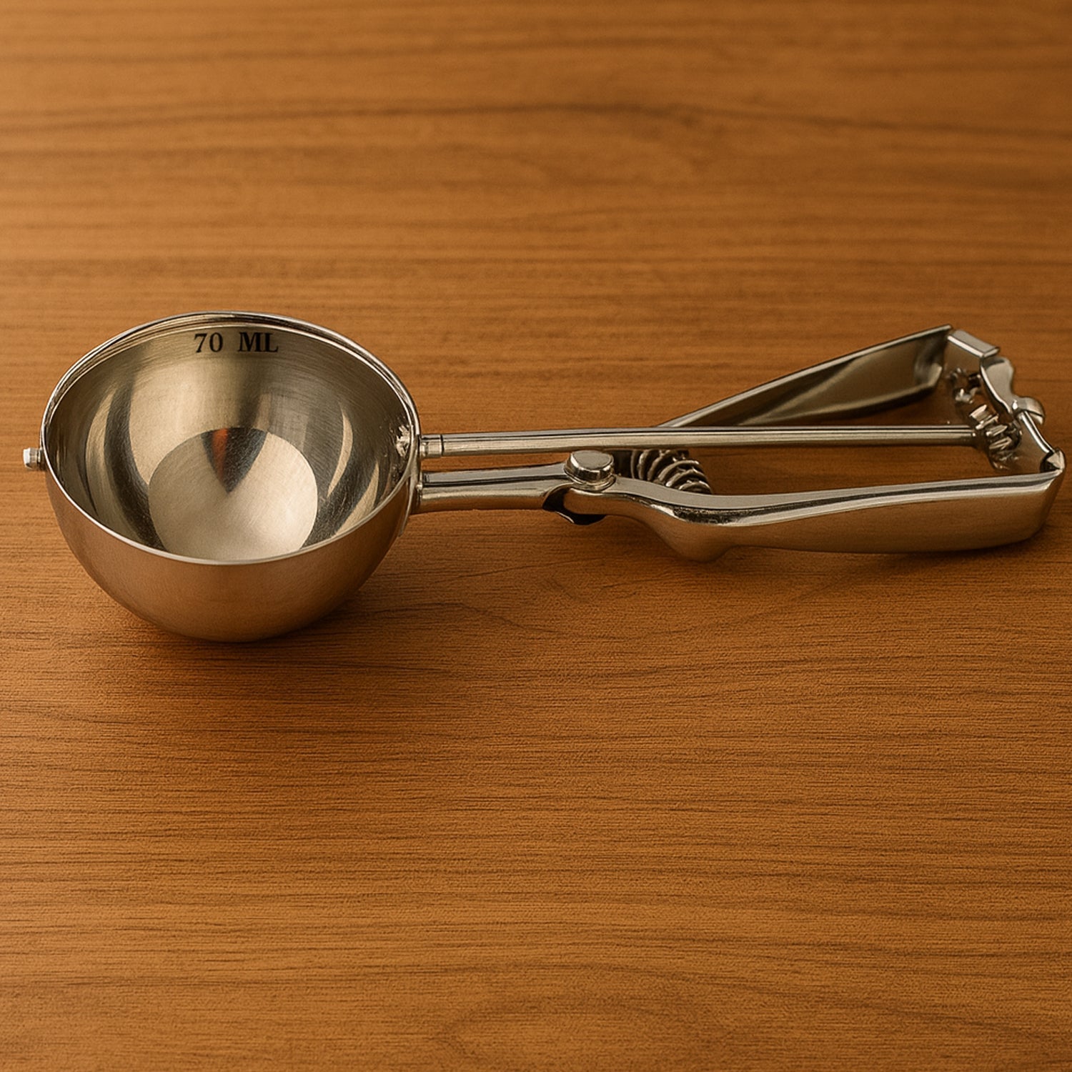 Stainless steel ice cream scoop featuring a comfortable trigger handle