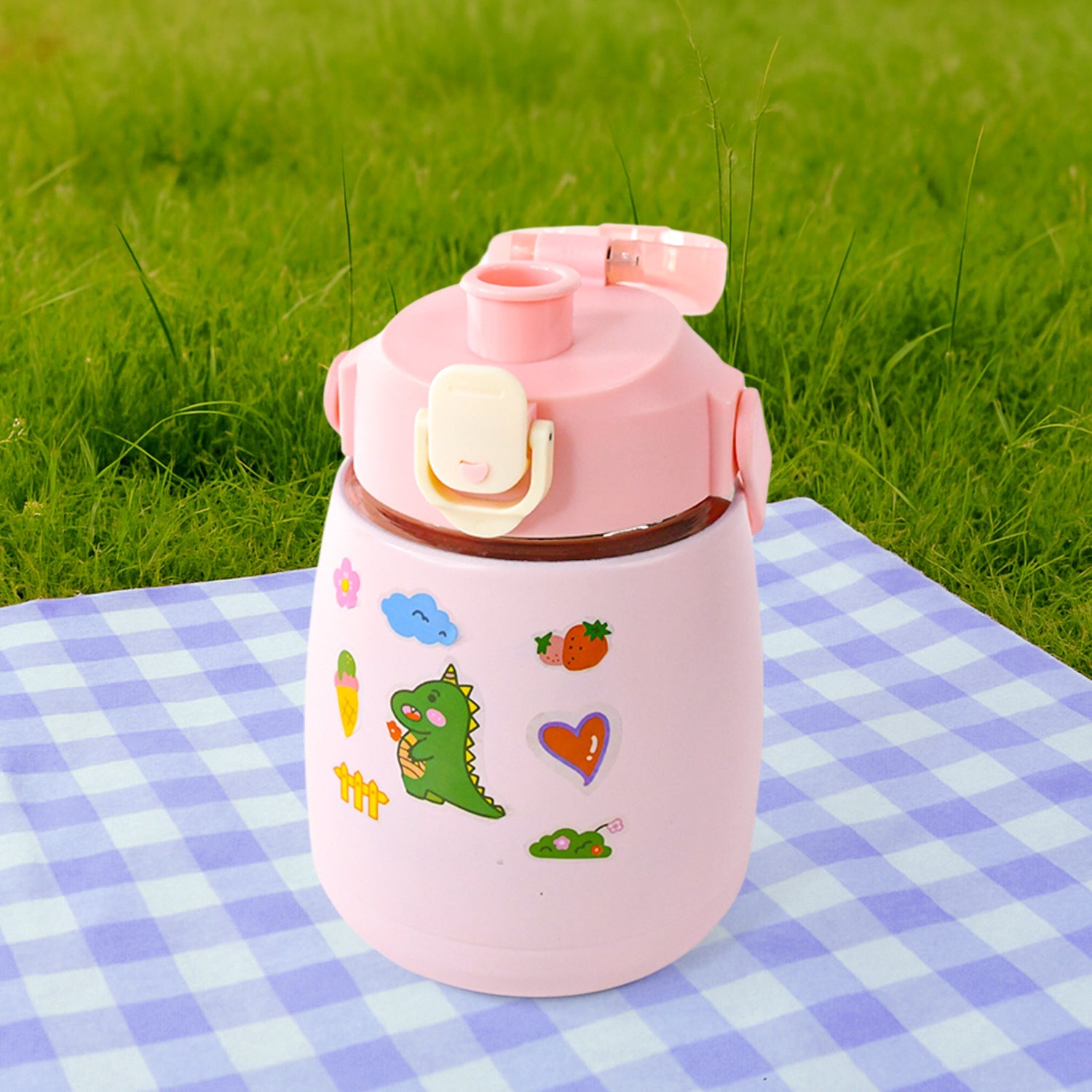 Insulated water bottle standing upright on a surface
