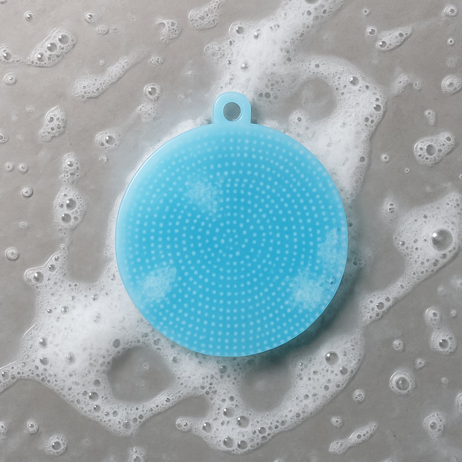 Sky blue silicone dish cleaner pad that resists heat and mildew