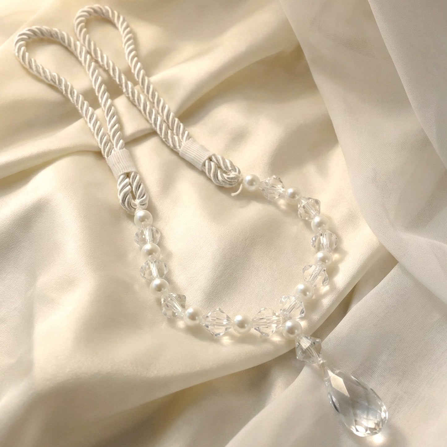 Glamorous crystal beaded curtain tieback in closeup