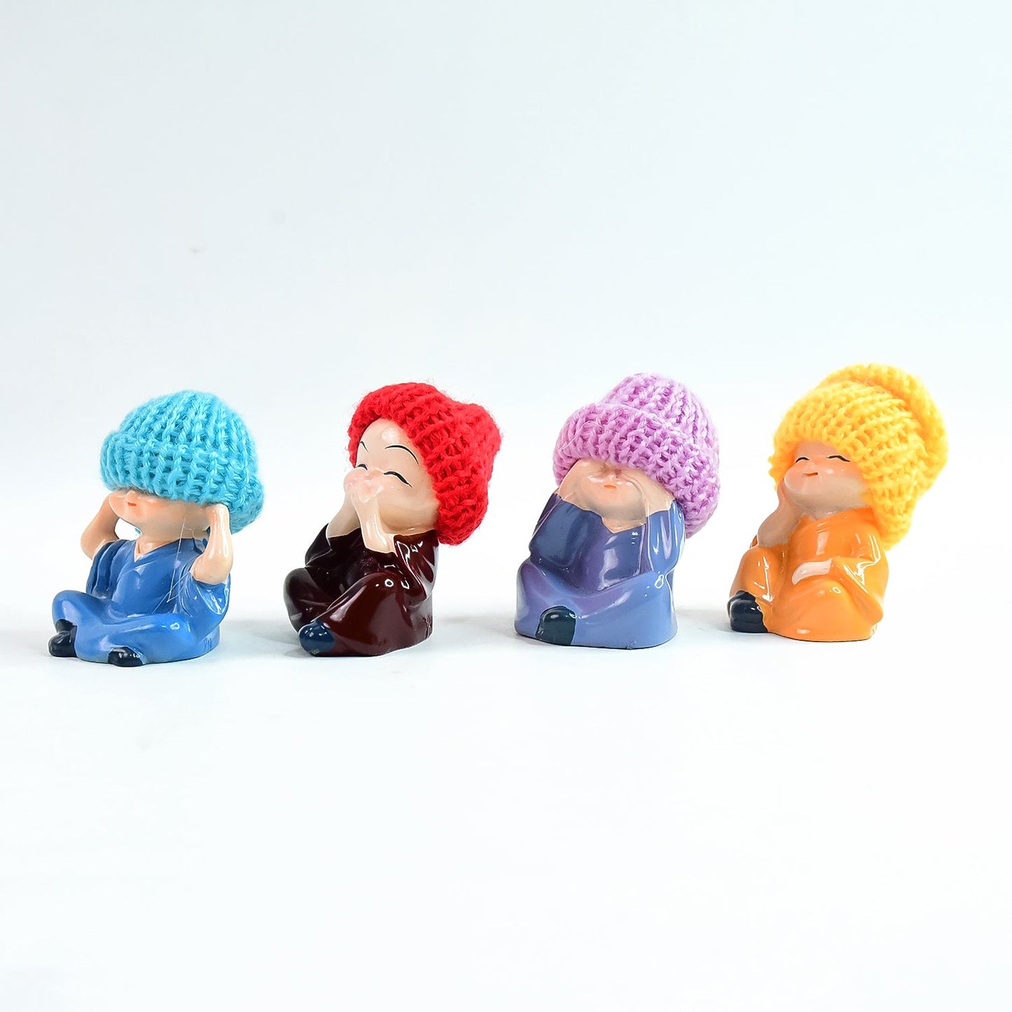 Decorative resin monk Buddha figurines set with straw hat accents for tabletop or dashboard display