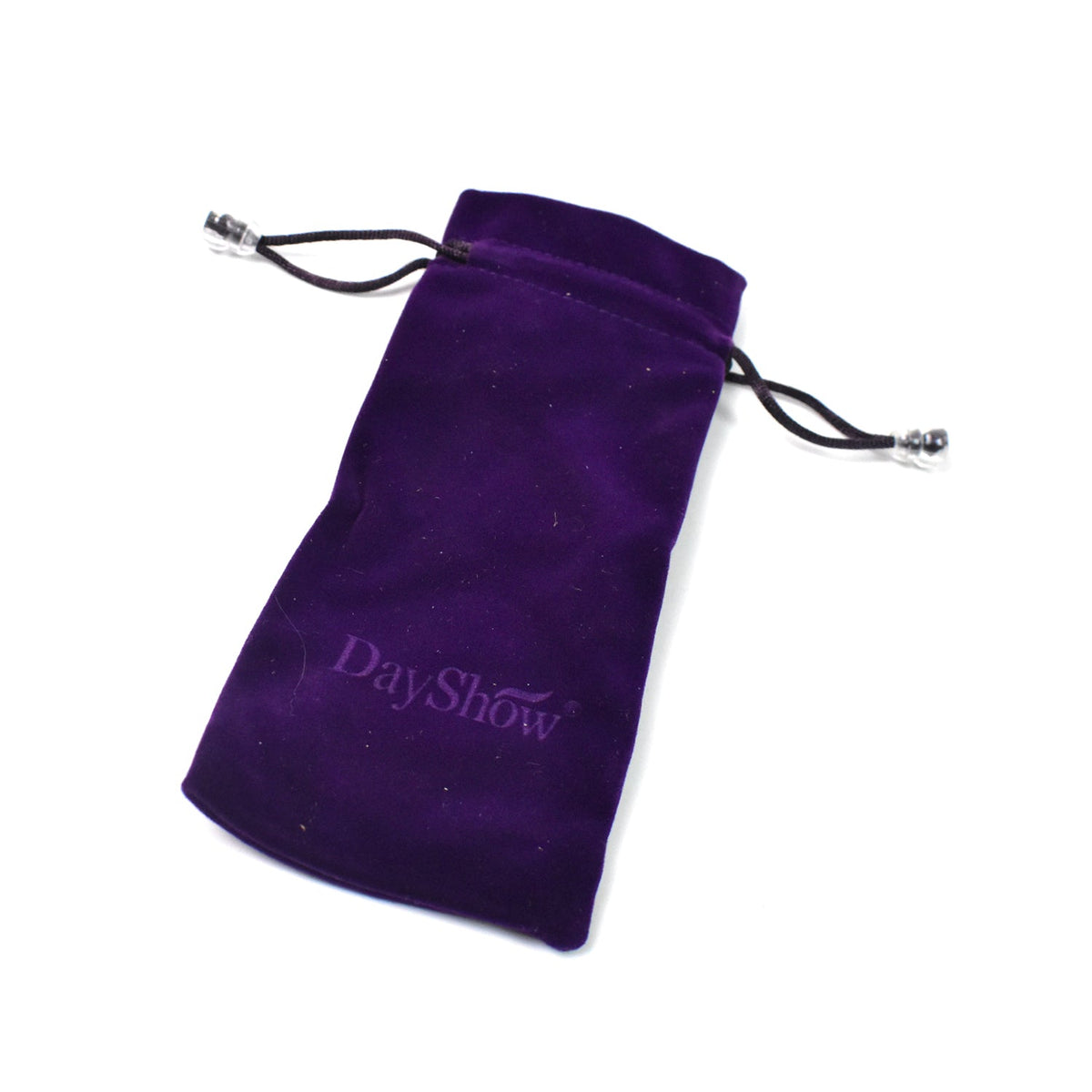 A purple velvet drawstring bag with a DayShow logo lies flat on a white background.