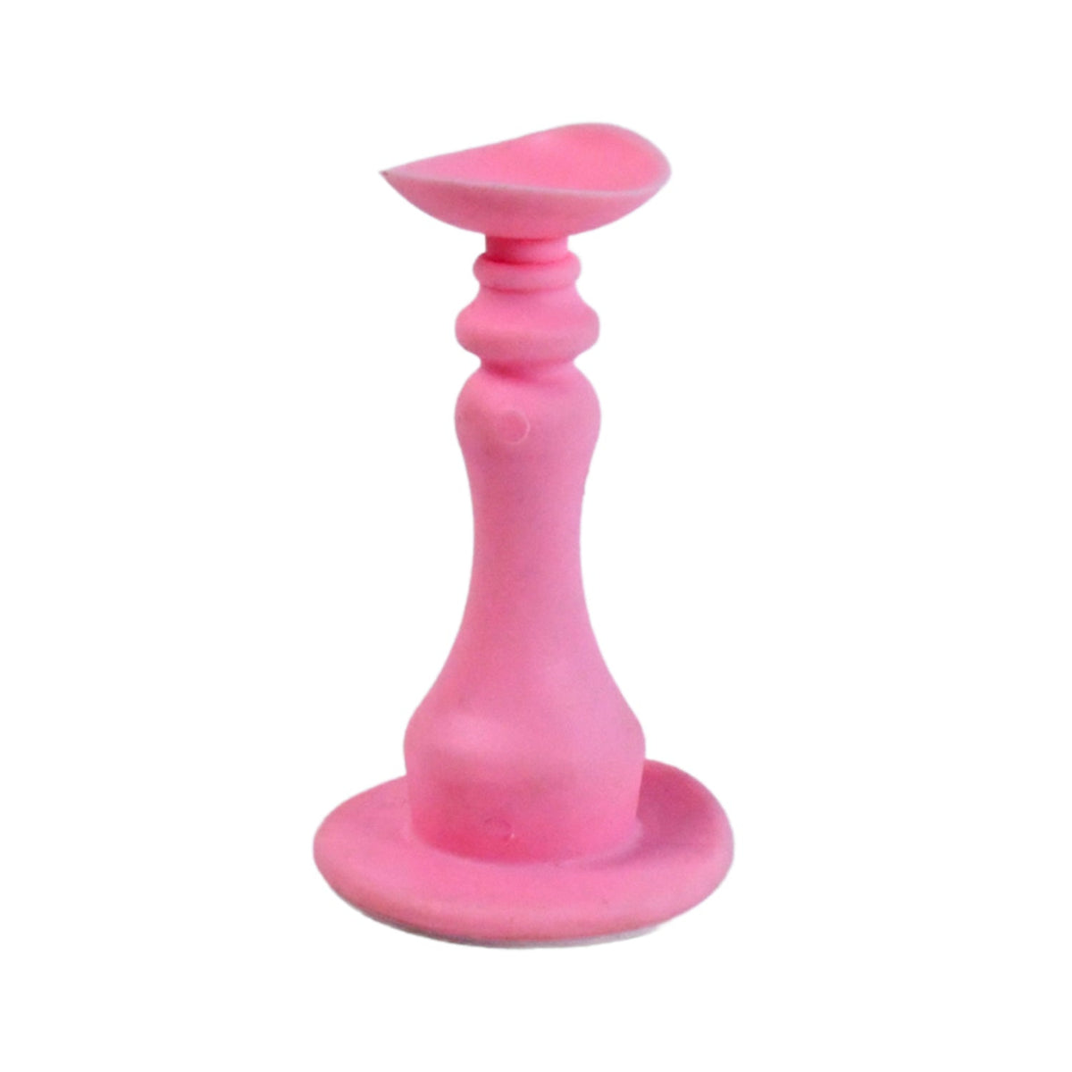 Pink silicone door stopper with a wide base and a curved top, isolated on a white background.