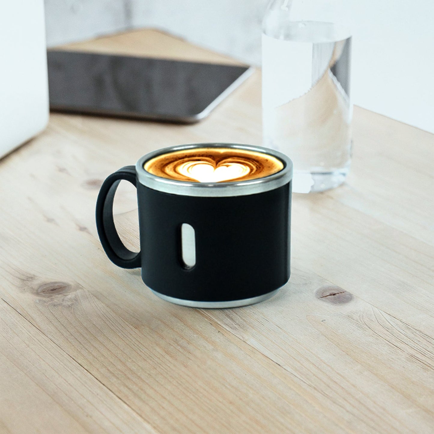 Six Apex stainless steel desk mugs stacked neatly on counter