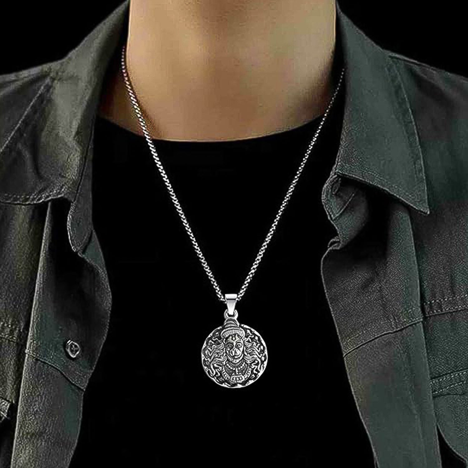 Side profile of the Hanuman Locket, revealing its thickness and craftsmanship.