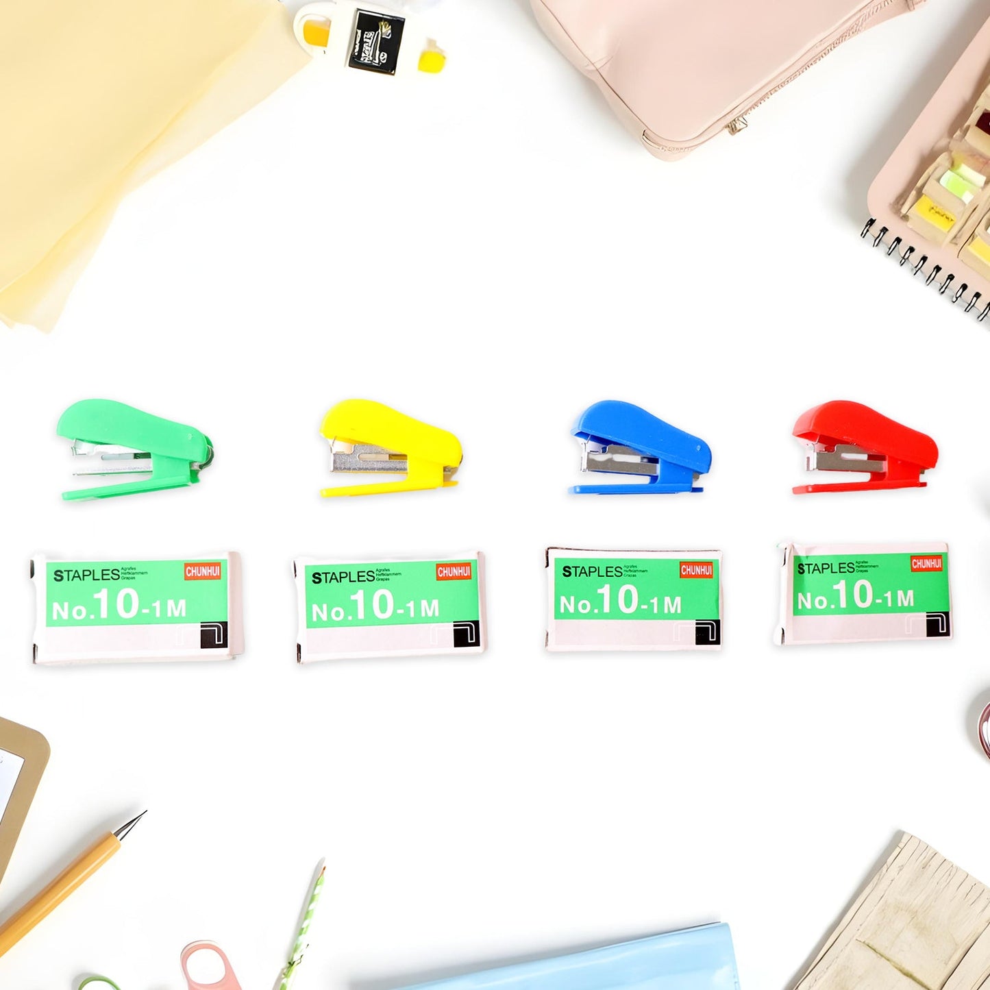 Mini stapler with smooth-action metal stapling mechanism
