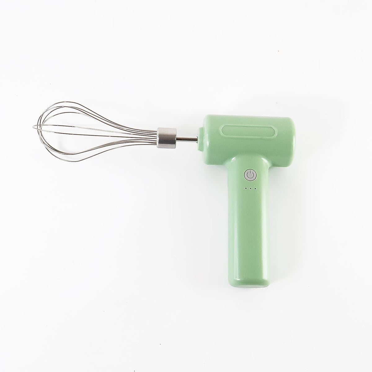 Top-down view of the light green cordless electric whisk with its stainless steel attachment.