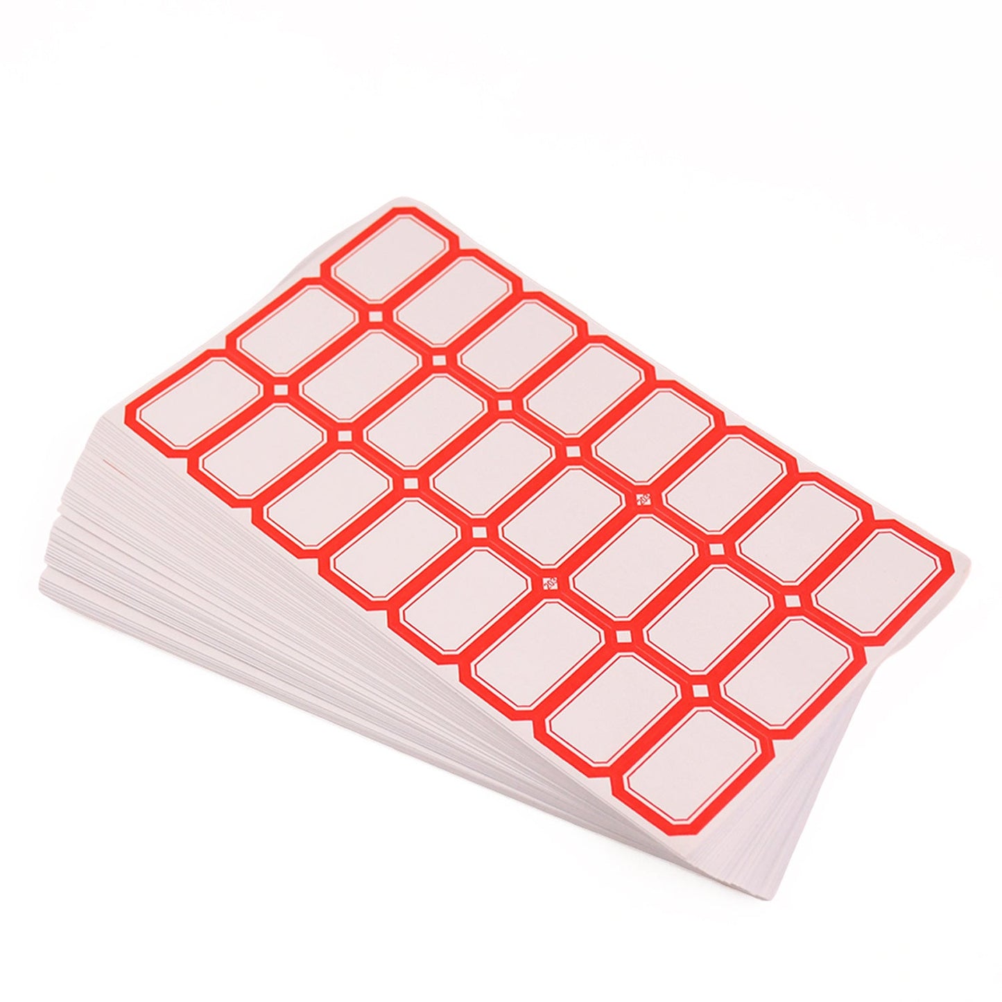 A stack of white labels with red borders, fanned out slightly, on a white background.