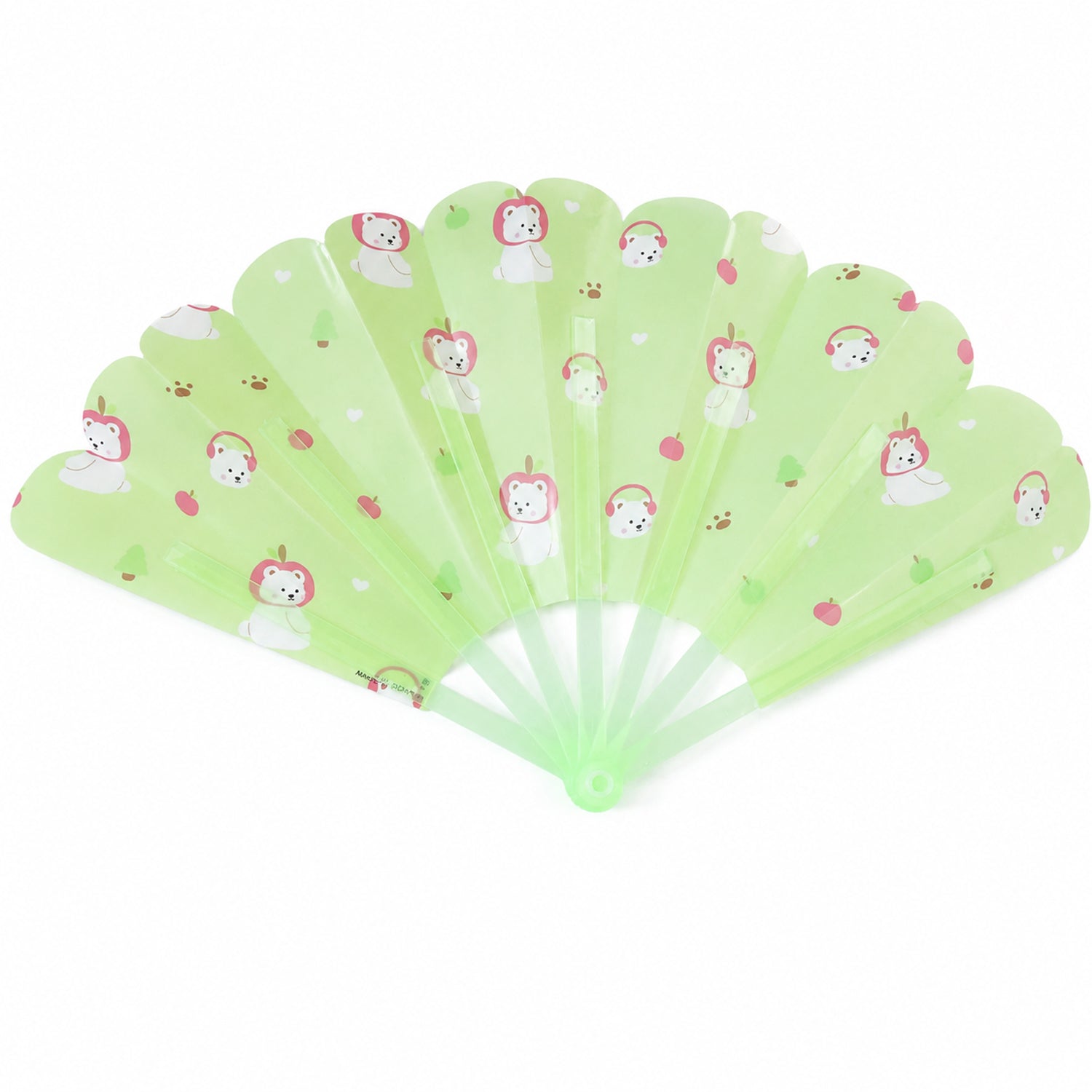 An open green plastic fan with a scalloped edge and a pattern of white bears and red apples.