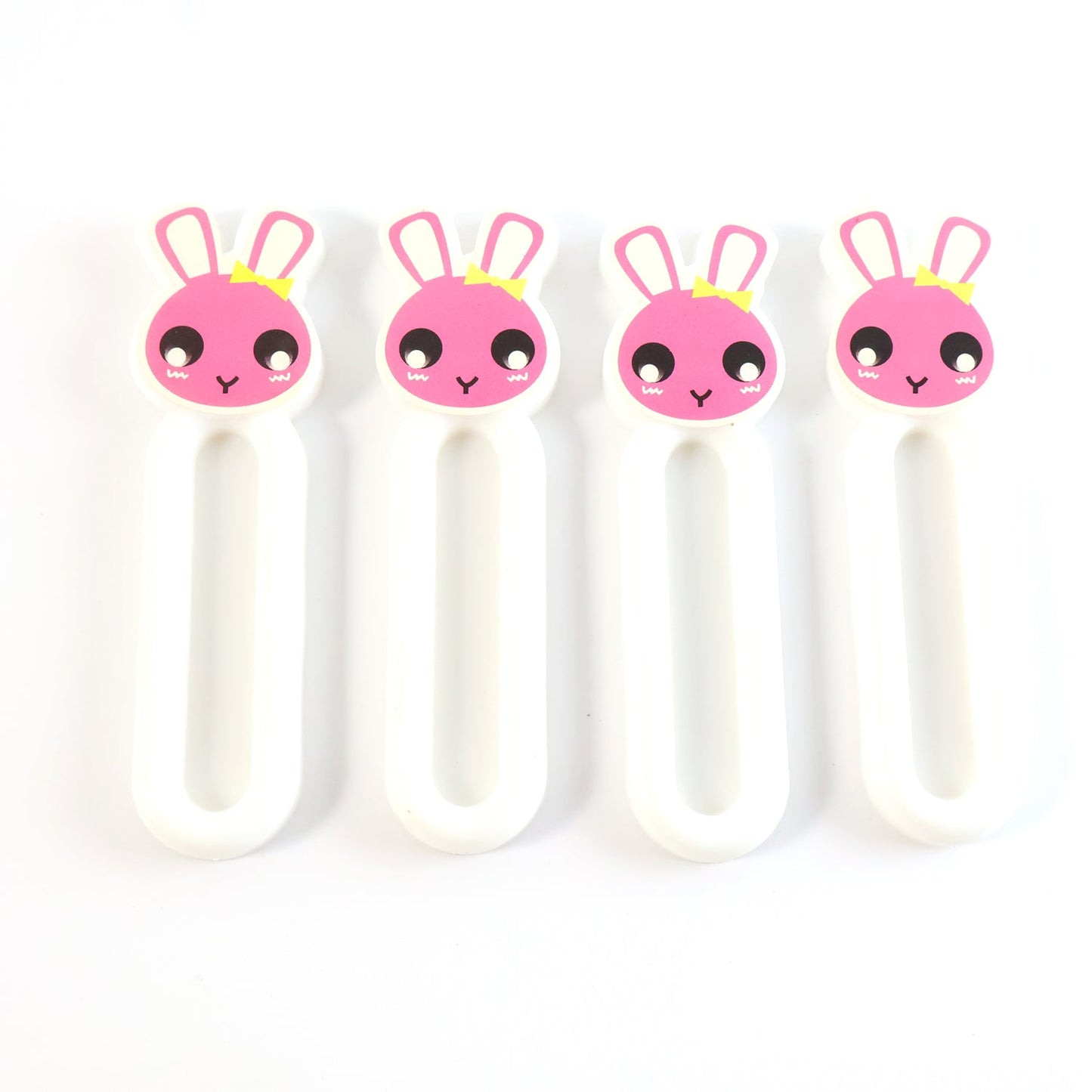 Pull handles mounted on cabinet doors using self stick push pull helper set