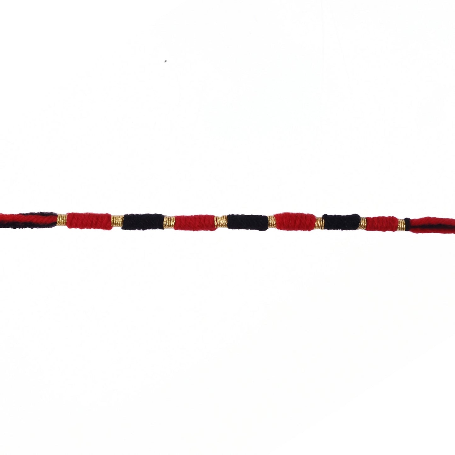 Red and black thread Rakhi with detailed craftsmanship
