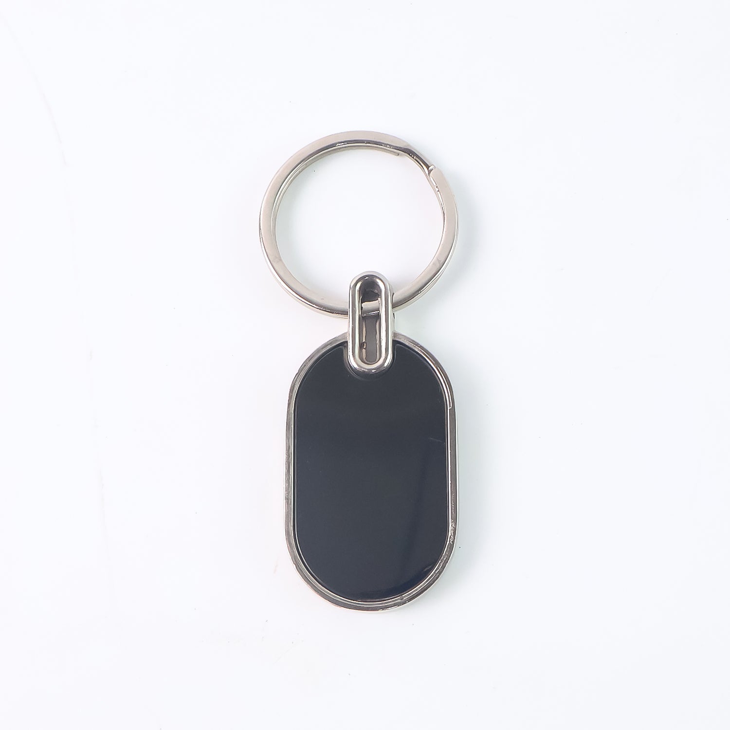 Monogram edge silver and black oval metal key holder accessory