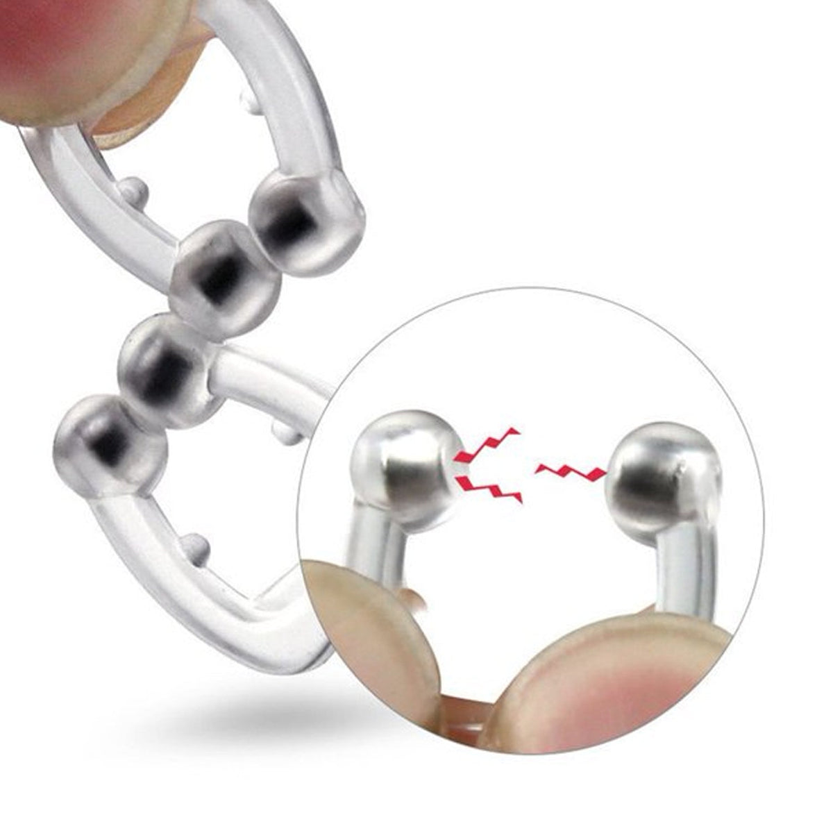 Multiple clear silicone magnetic anti-snore nose clips in their individual protective cases.