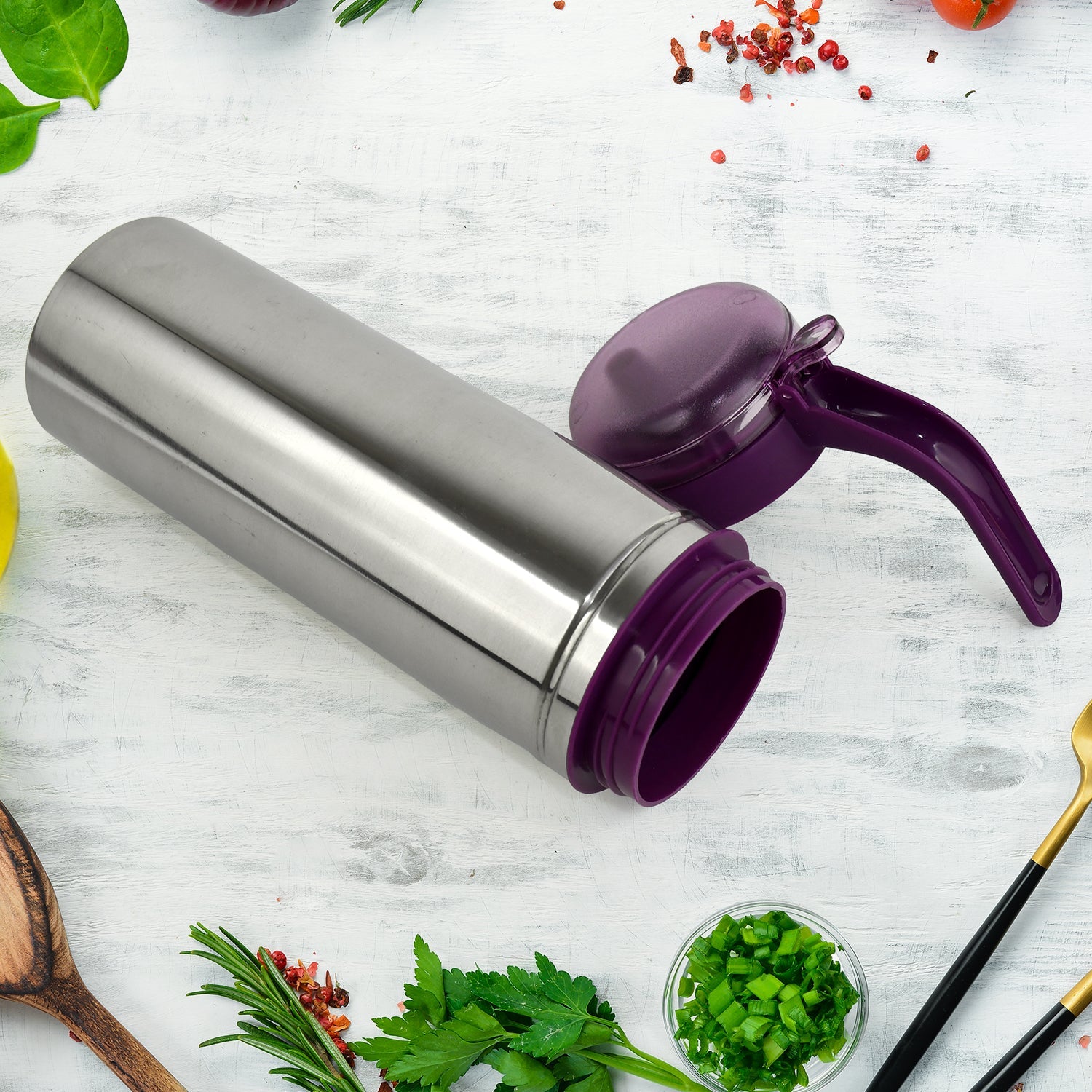 Daily use stainless steel oil dispenser with anti-spill spout