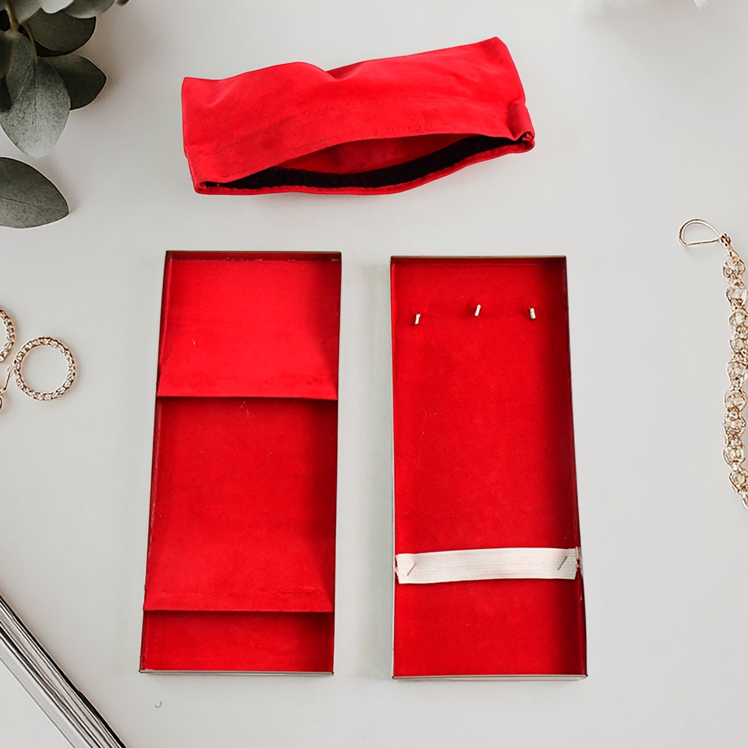 Close-up of the red velvet compartments within the lockable Jewellery Storage Box, ideal for organisation.