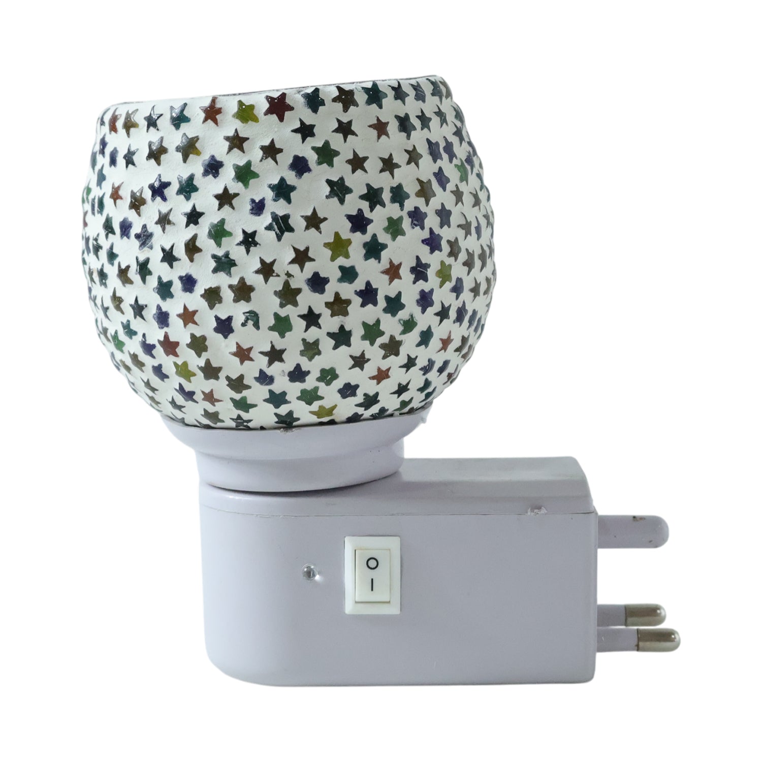 Warm glowing star pattern mosaic glass night lamp creating cozy ambience
