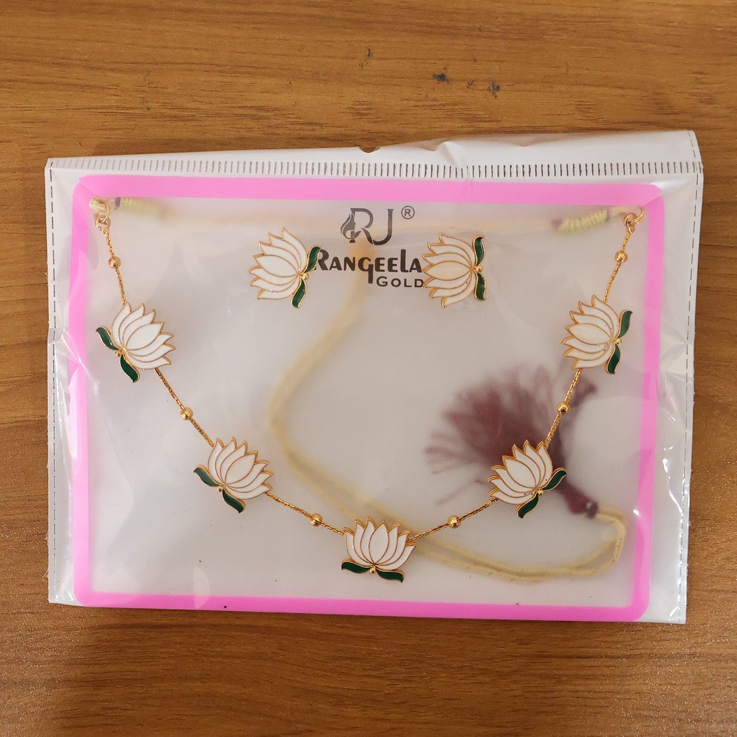 Coordinated white lotus design necklace and stud earrings jewellery set