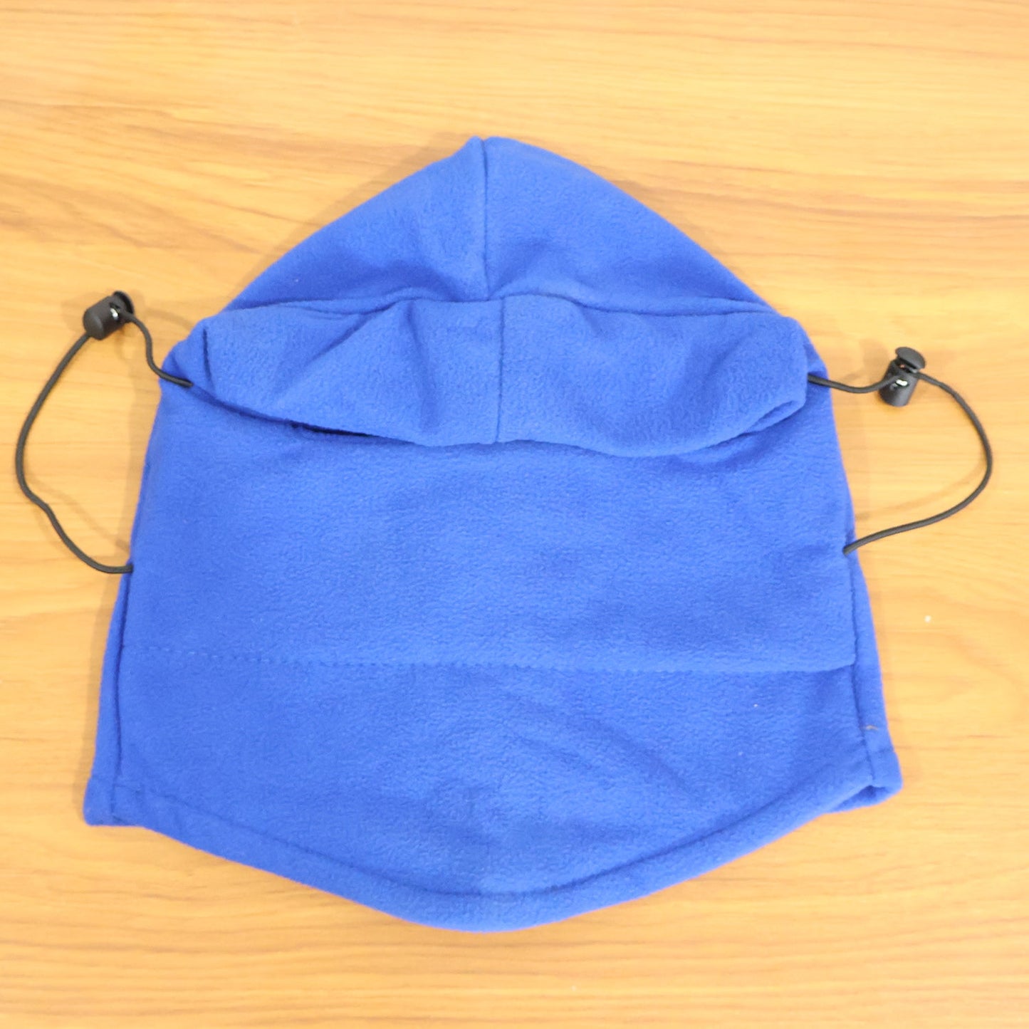Winter fleece face cover emphasizing thermal insulation and windproof design