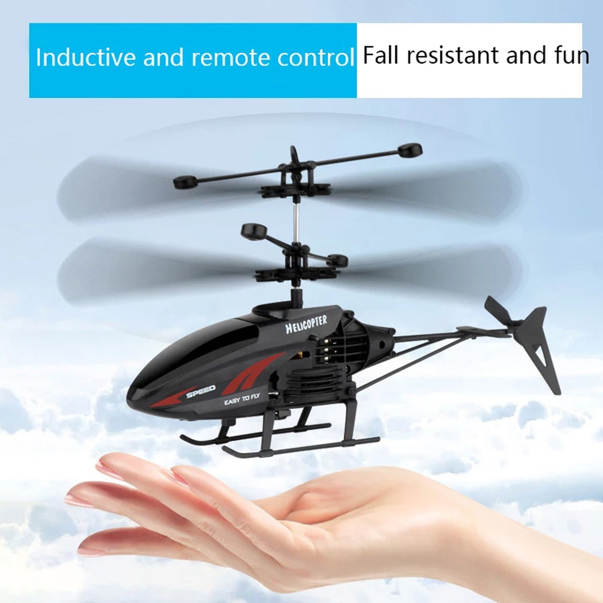A red and black toy helicopter hovering above an open hand against a blue sky with clouds.