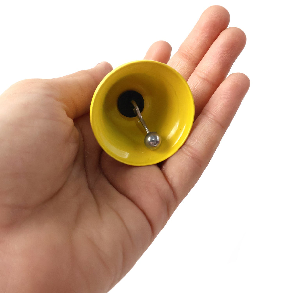 A person's hand holding a yellow mini hand bell keychain, showing the clapper inside the bell.