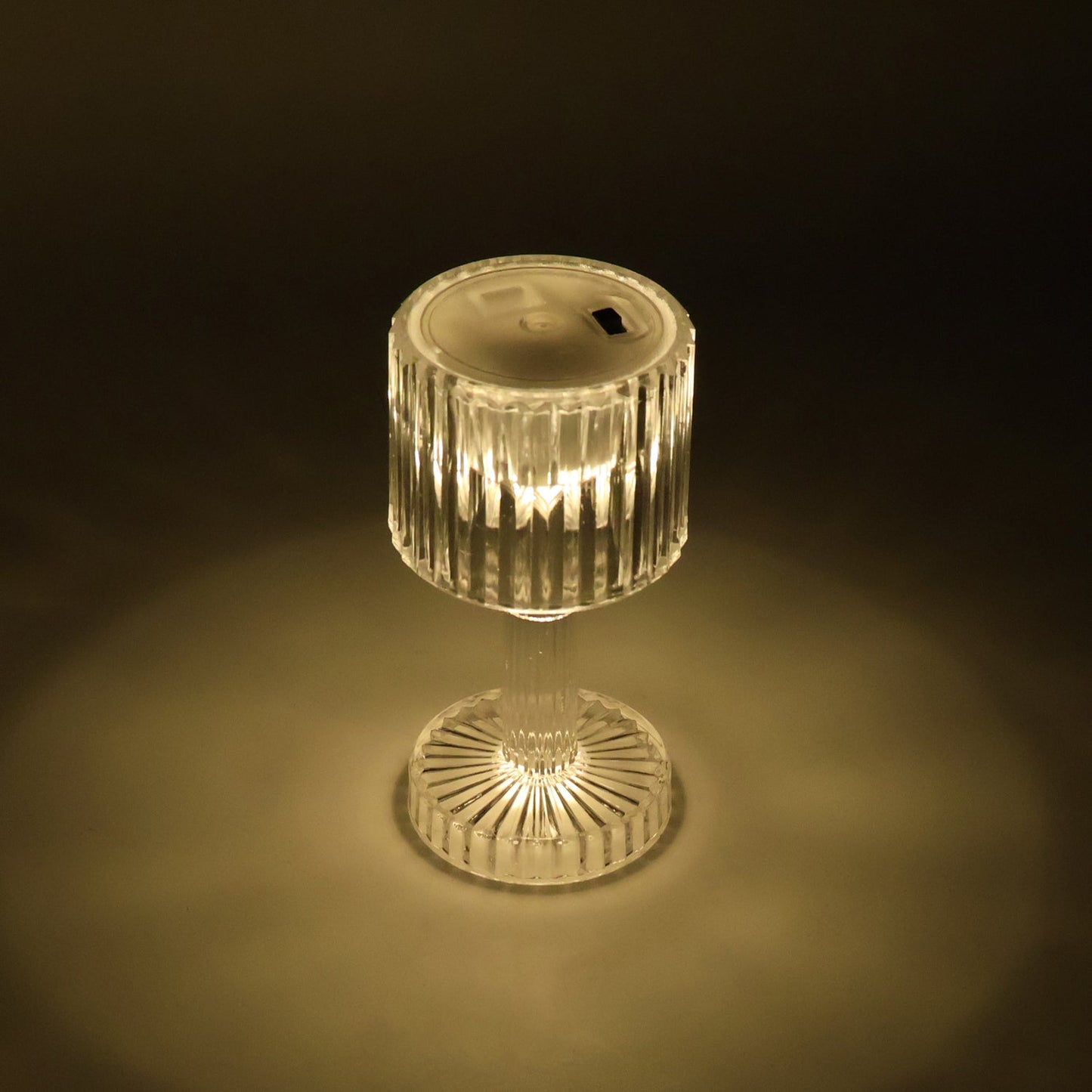 Night ambience created by warm light of LED crystal-effect table lamps