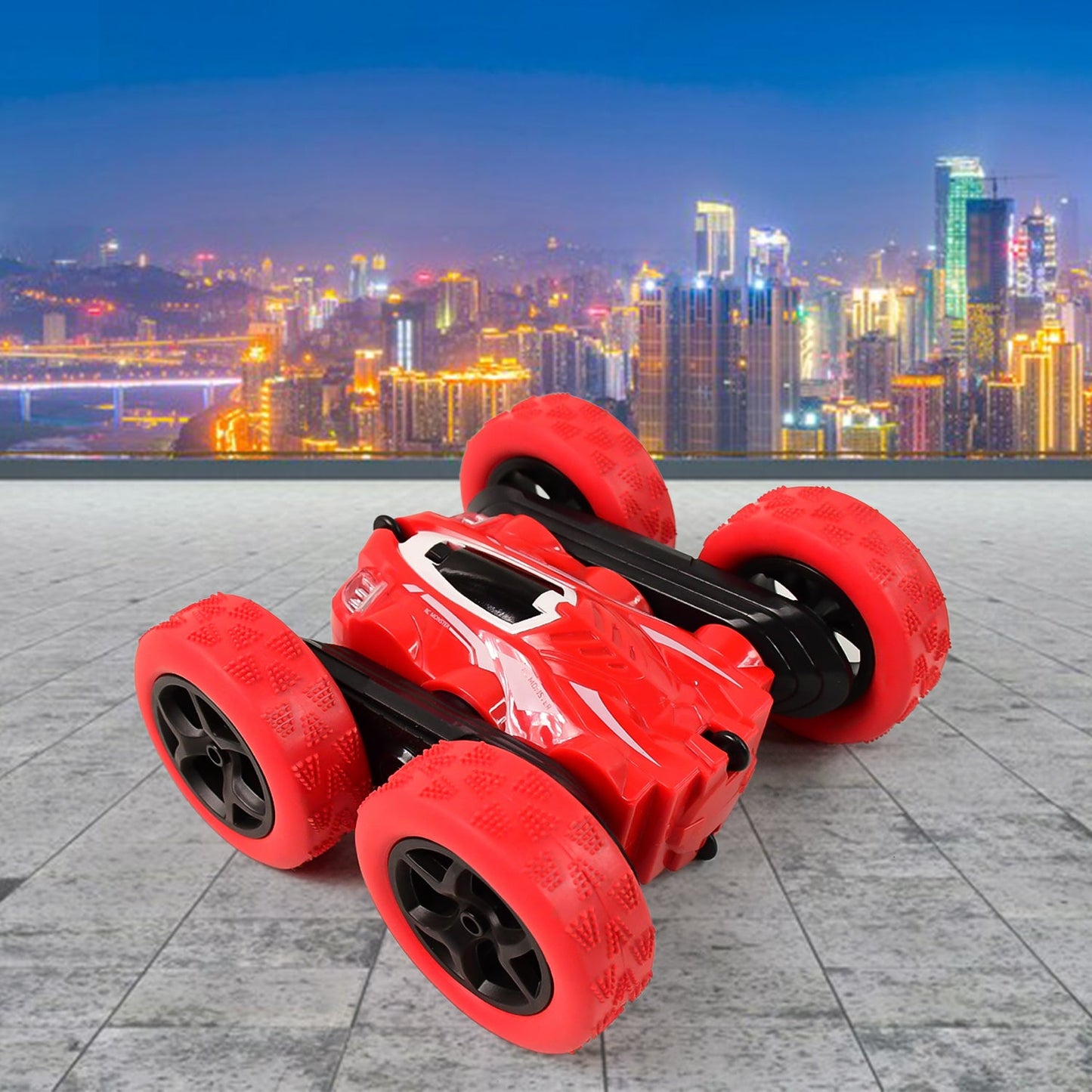 Closeup of Electroplay remote control stunt car front wheel and body