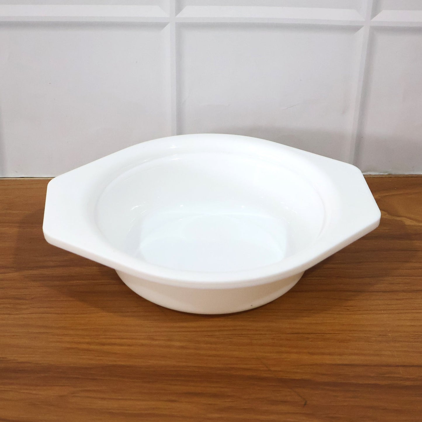 Plastic kitchen mixing bowl with modern neutral design and side tabs