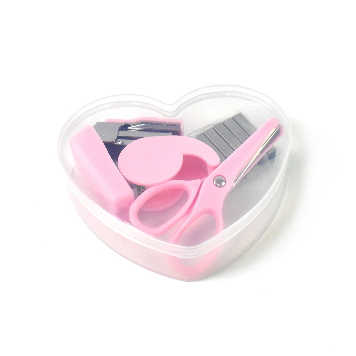 A clear heart-shaped container holding a pink stapler, tape dispenser, scissors, and staples on a white background.