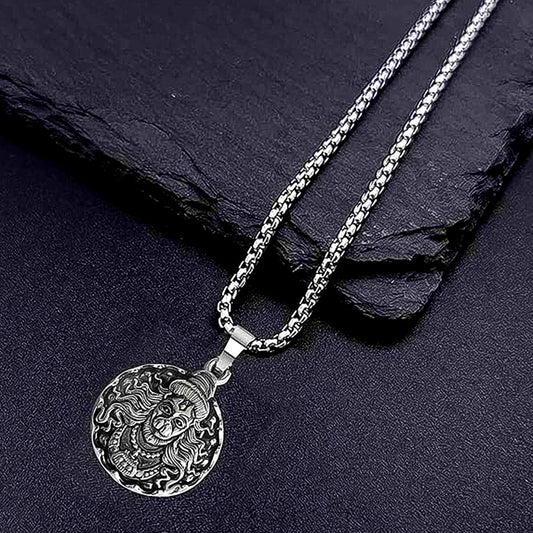 Close-up of the handcrafted Hanuman Locket with silver chain, showcasing intricate details.