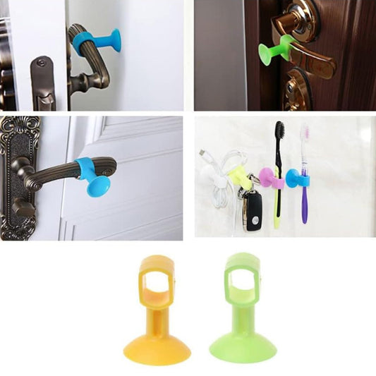 Silicone door stopper attached to a door handle, protecting the wall.