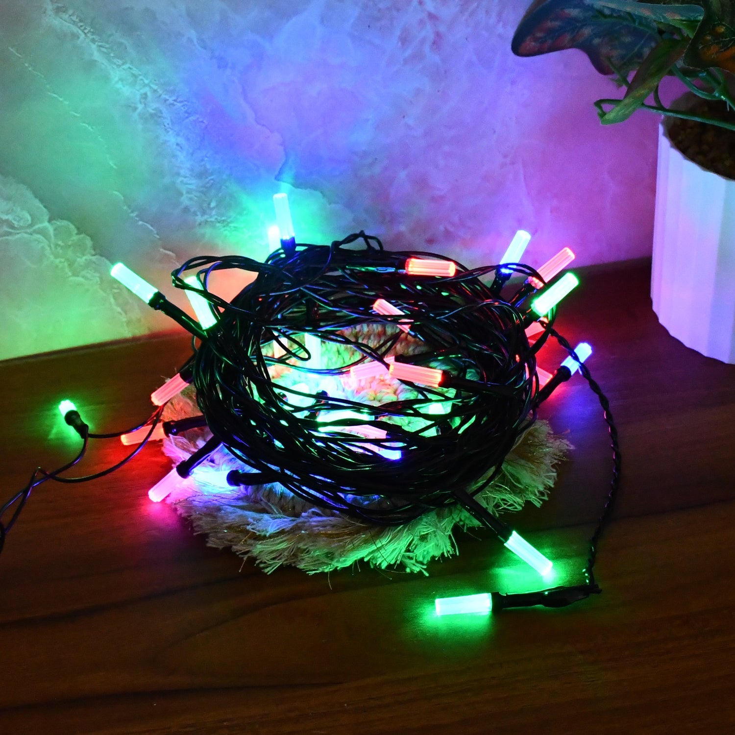 Decorative multi-color LED string lights shown lit up for wedding decoration