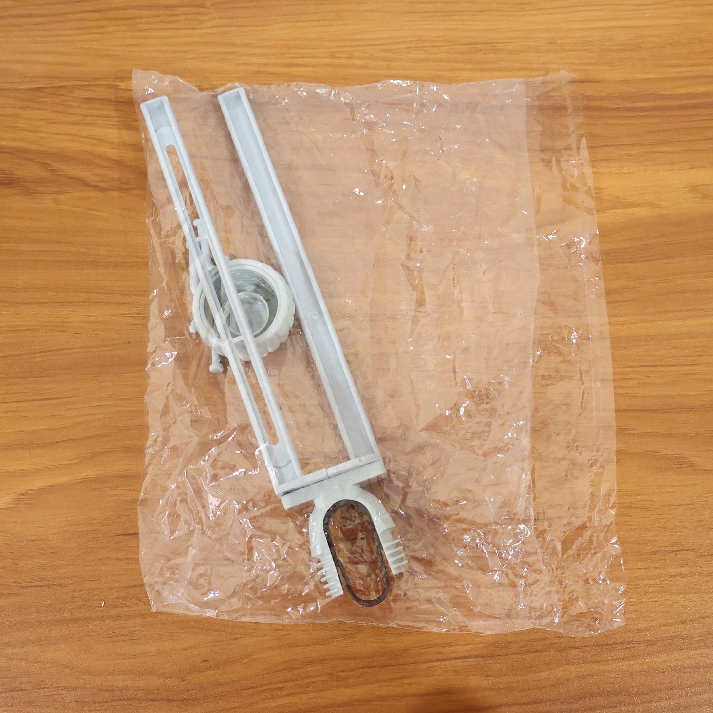 Multipurpose organizer hanging from kitchen sink faucet
