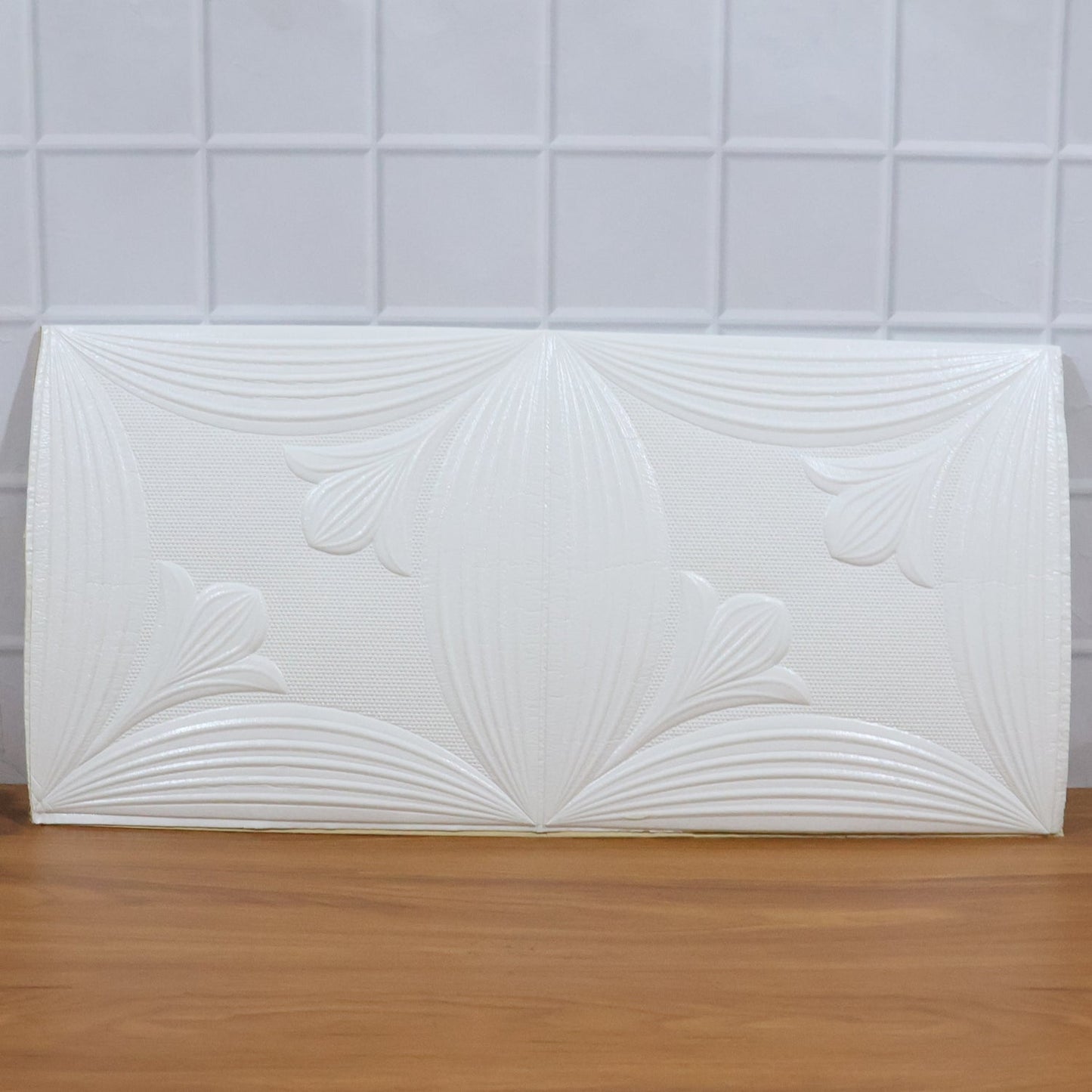 Textured white floral 3D foam wallpaper panel enhancing home interior aesthetics