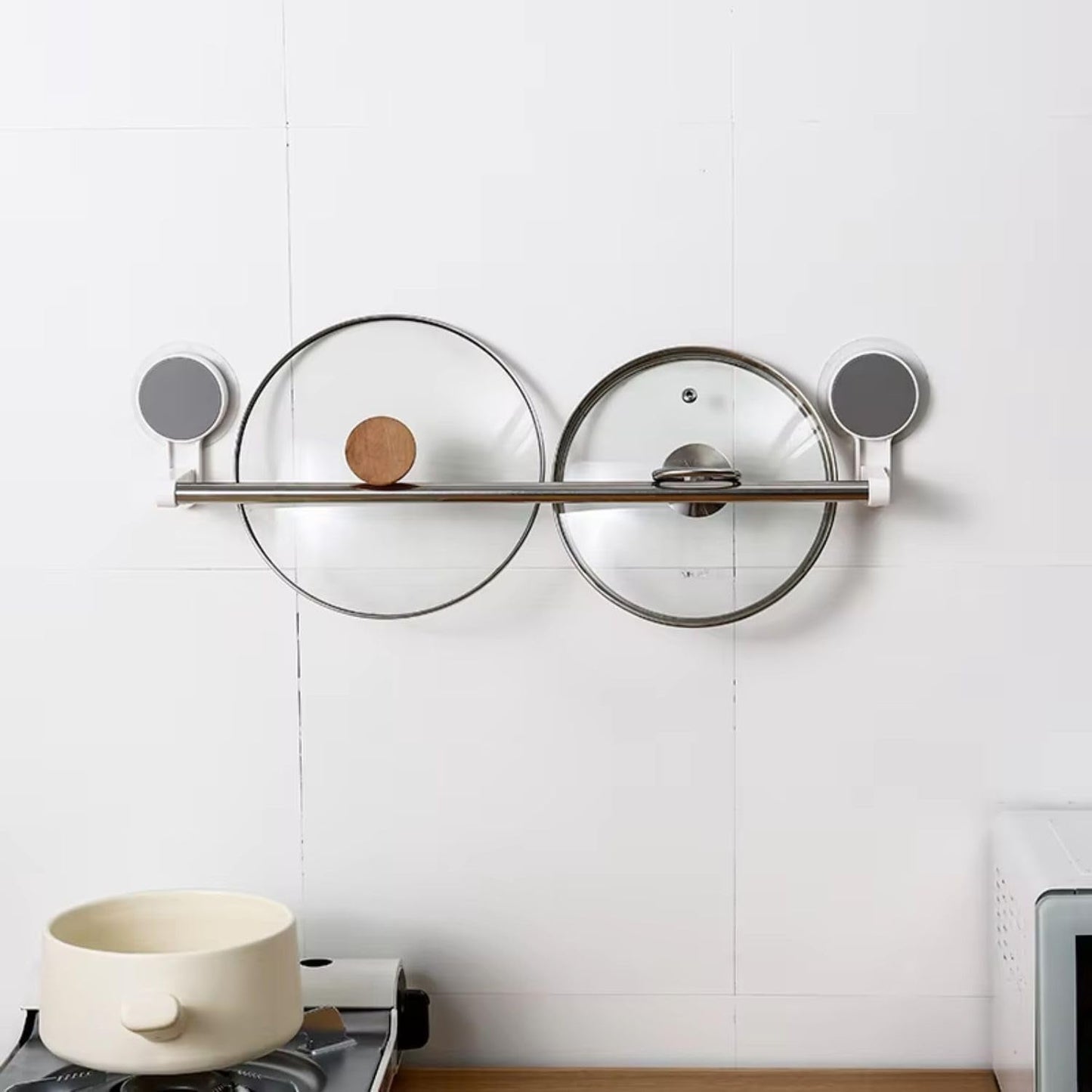Detail of self-adhesive towel rack showing strong mounting surface