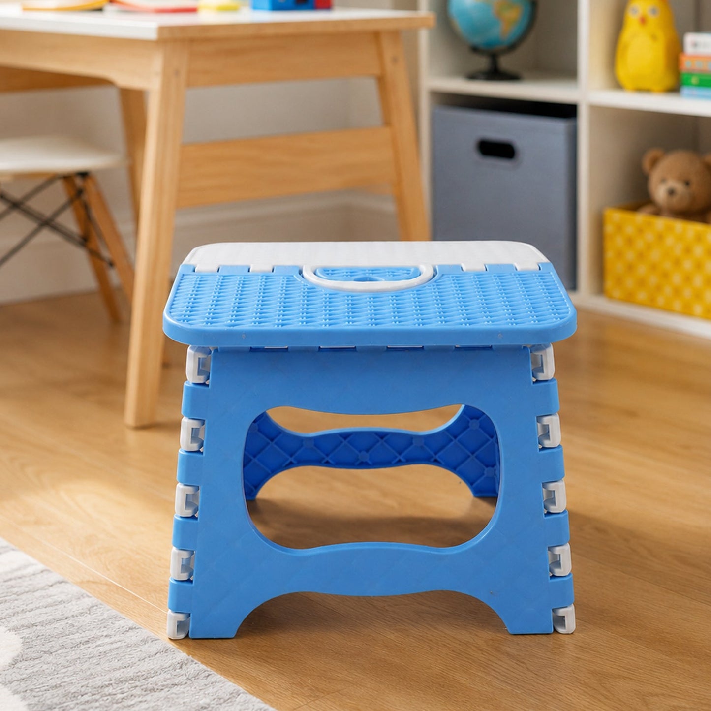 Non-slip base of a plastic stool