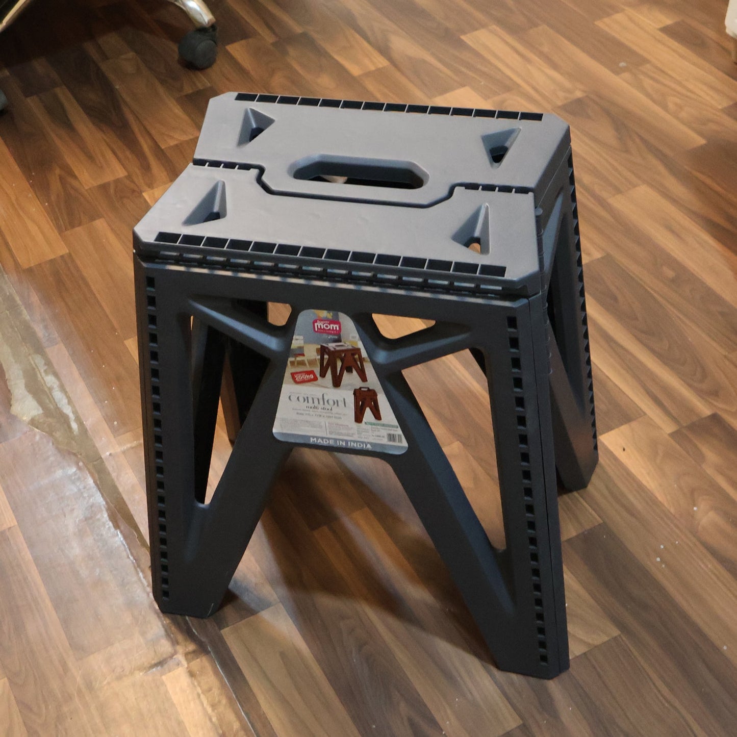 Supermom 18 inch folding stool in outdoor garden setting