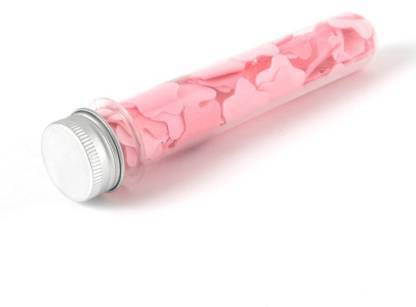 A clear tube filled with pink flower-shaped paper soap strips and a silver screw-top lid is on a white surface.