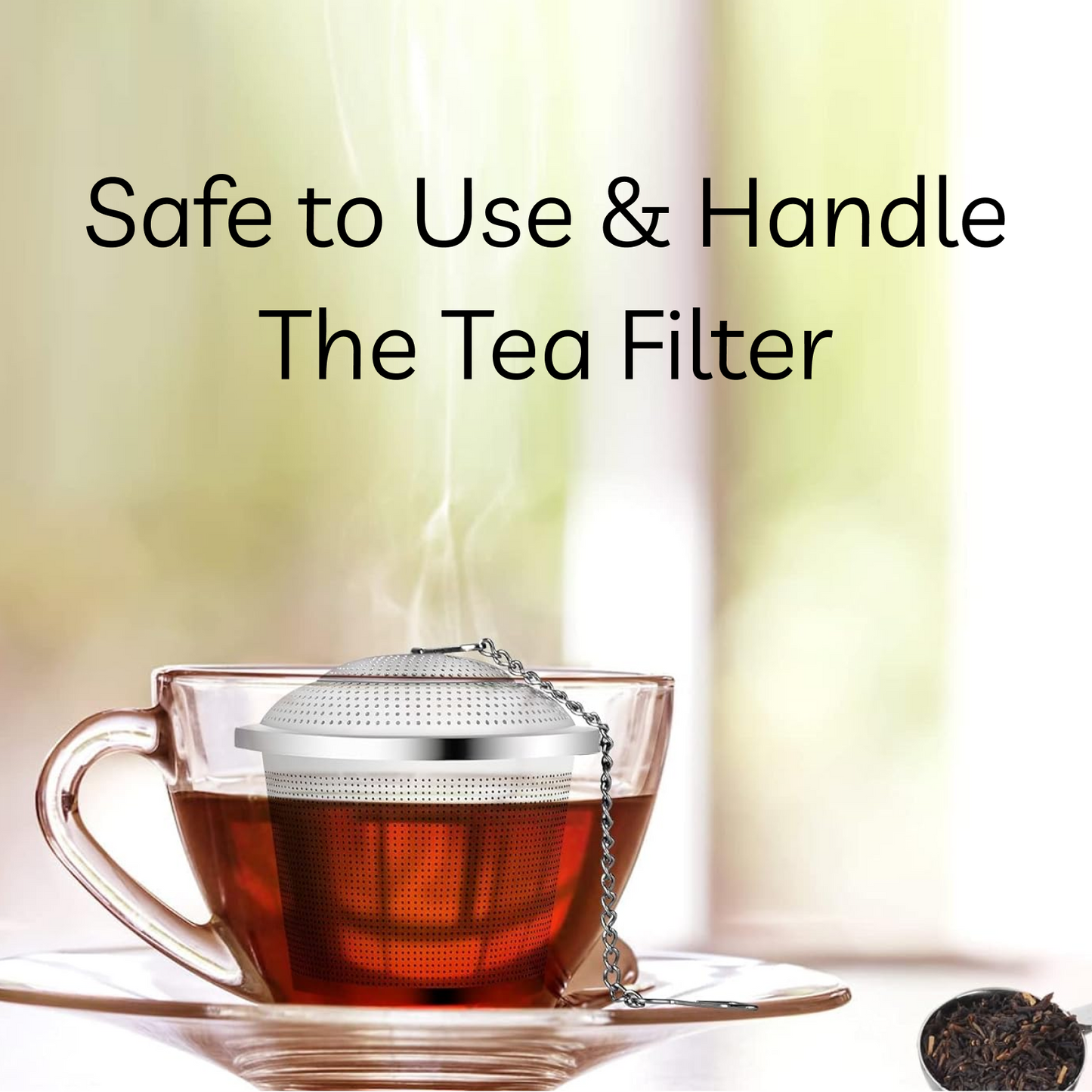 A stainless steel tea infuser steeping in a clear glass mug of tea, with text overlayed: "Safe to Use & Handle The Tea