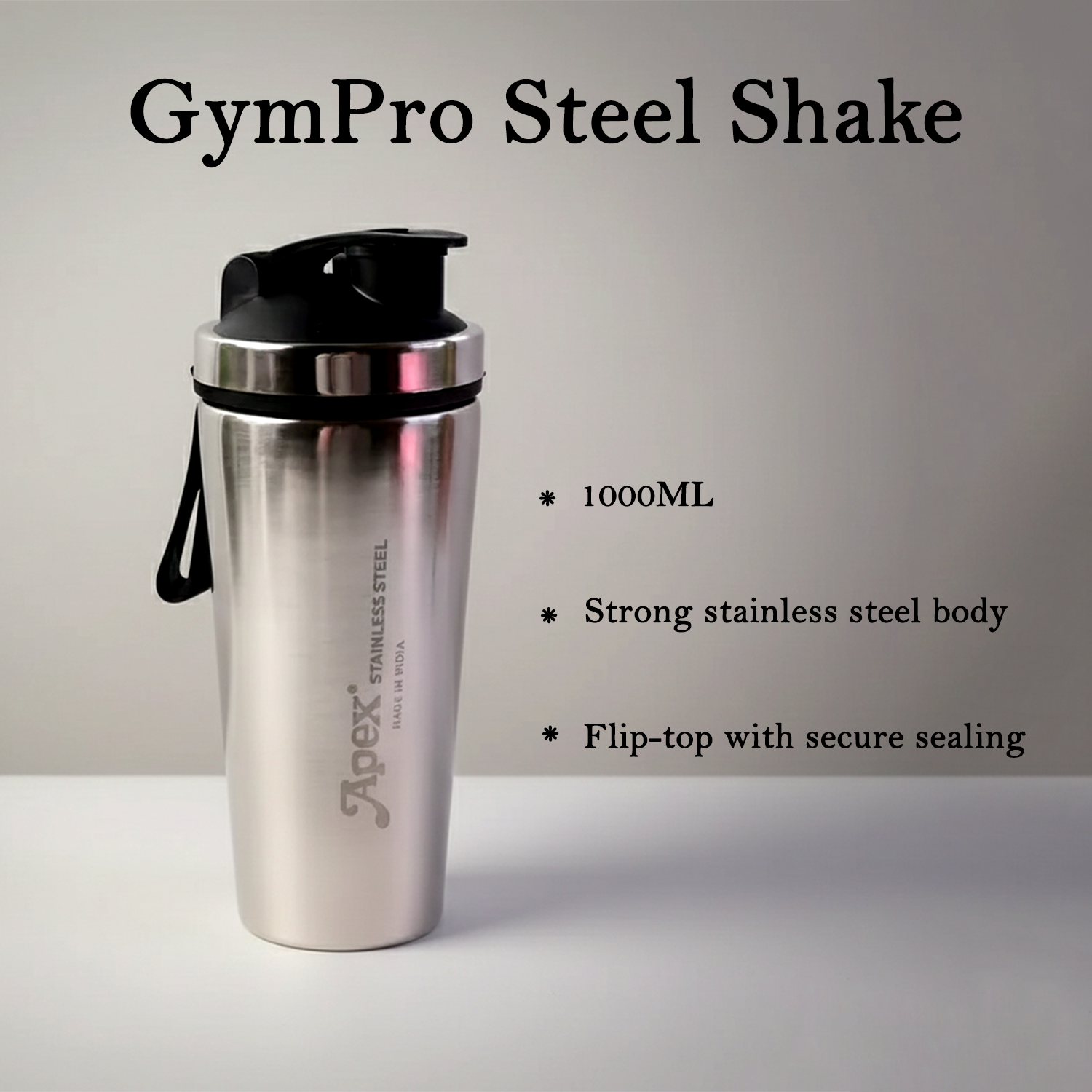 Close-up of stainless steel gym shaker bottle and spring whisk