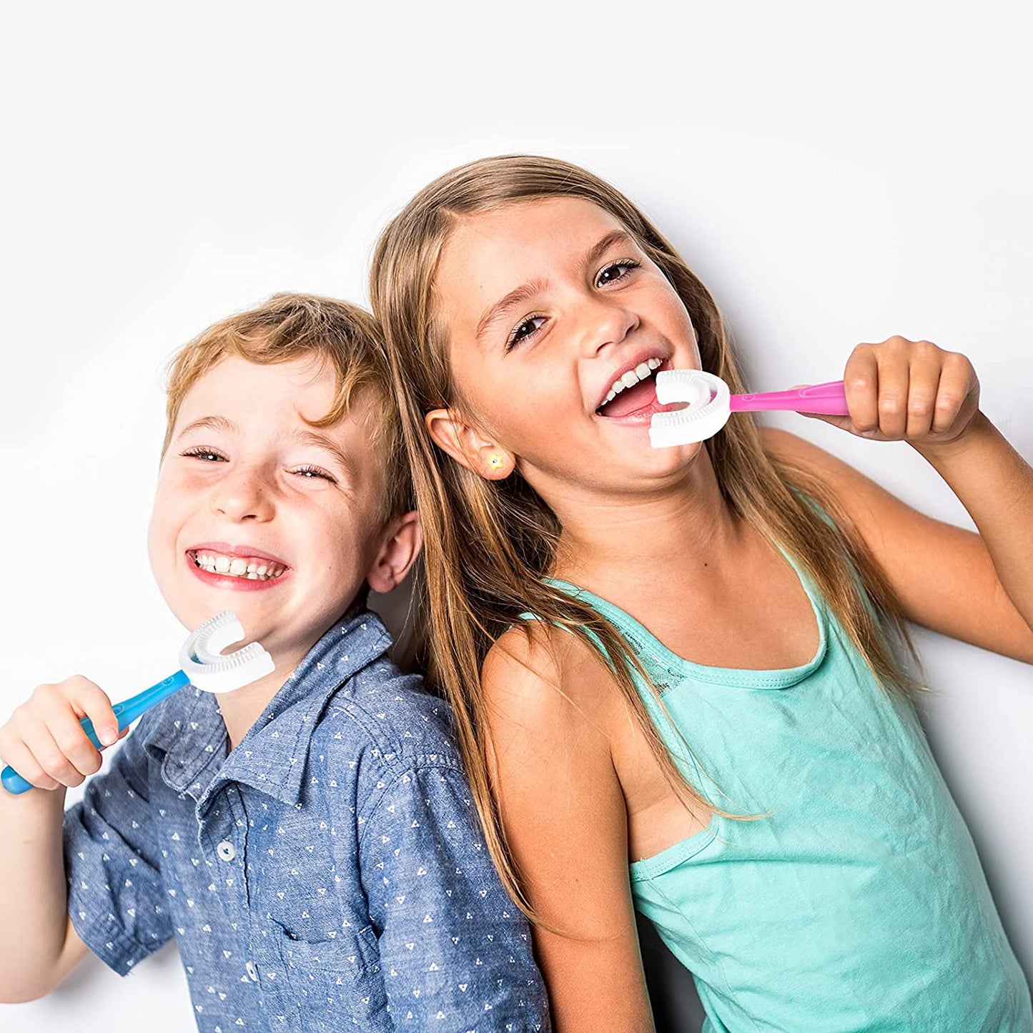 Kids U-shaped silicone toothbrush in yellow, designed for easy and effective brushing.