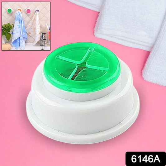 The compact towel holder neatly organising a folded towel in a modern bathroom setting.