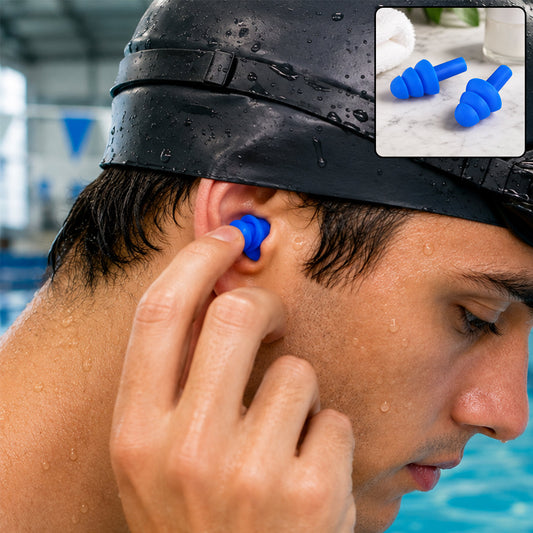 A man in a black swim cap inserts a blue silicone earplug into his ear, with a small inset showing the earplugs.