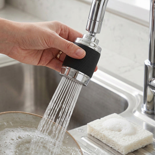 Faucet sprayer attached to kitchen sink for versatile cleaning