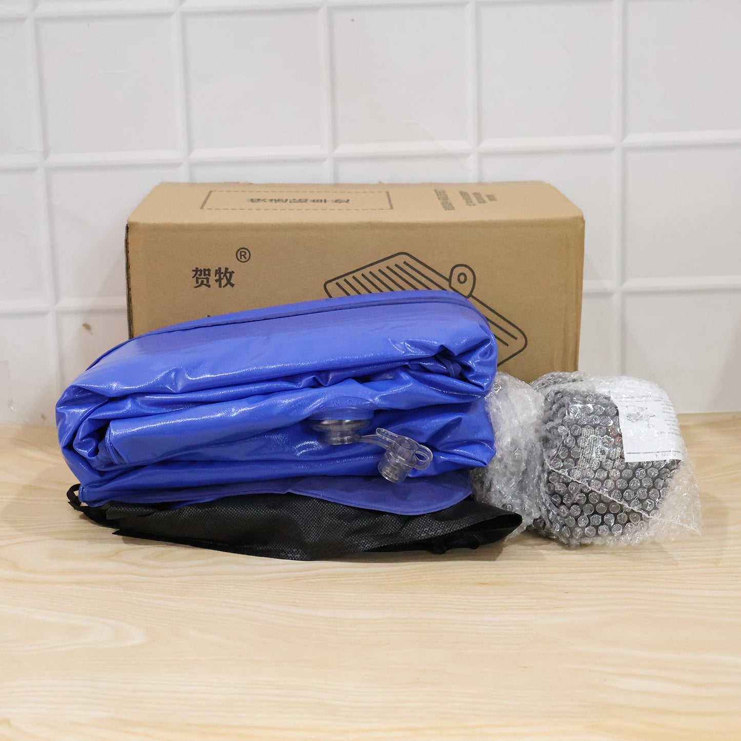Folded inflatable car mattress with packaging box for portability