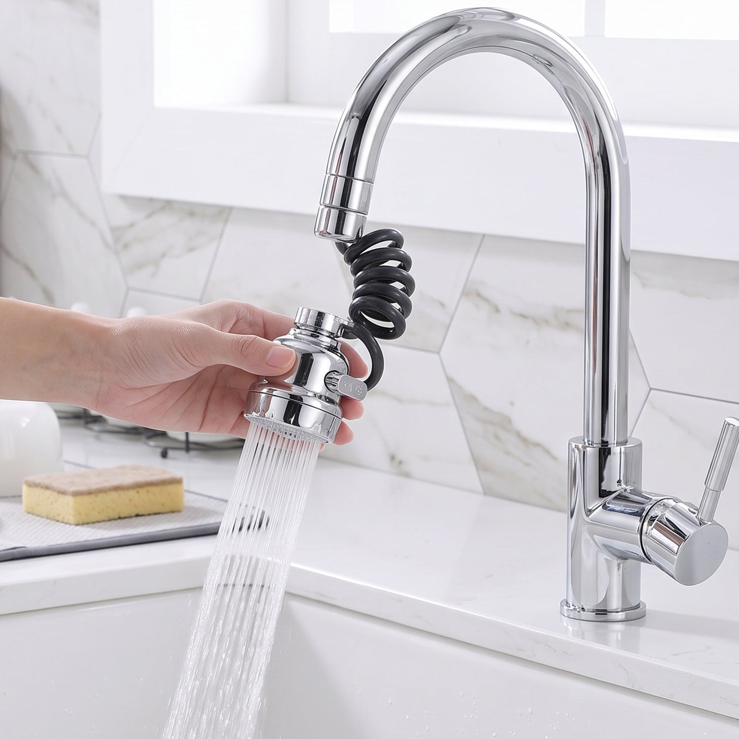 Kitchen faucet sprayer attached to sink tap