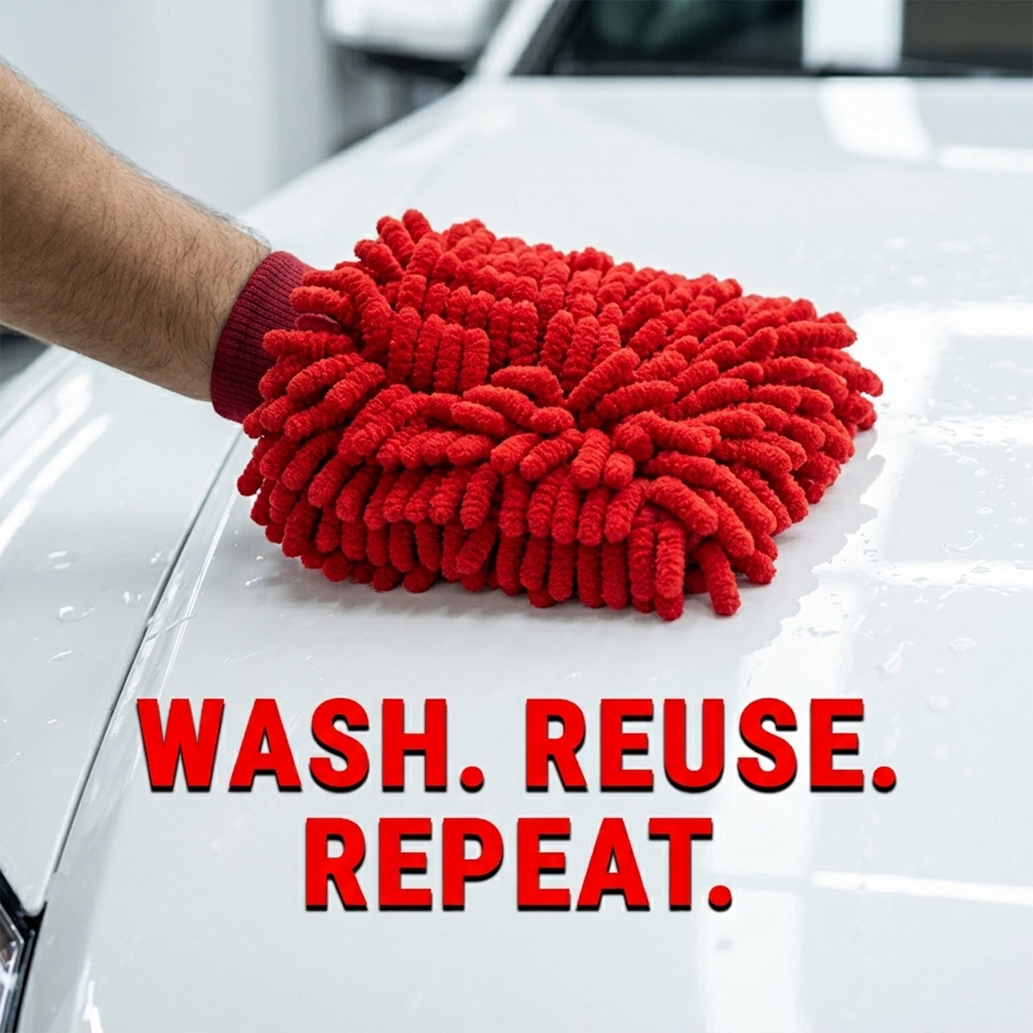 A hand wearing a red microfiber chenille wash glove cleans the white hood of a car, with the text "WASH. REUSE. REPEAT."